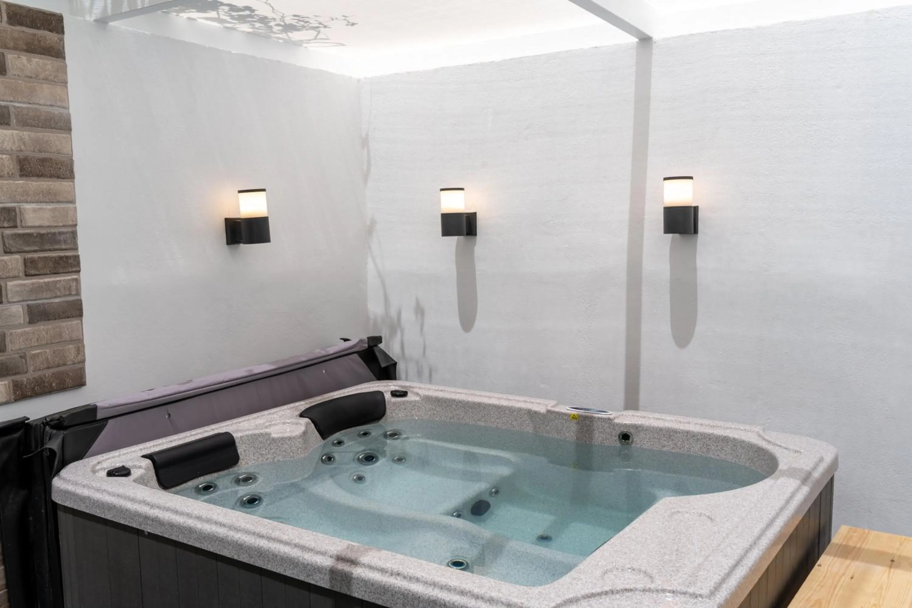 Hot Tub in City and Sand Suites
