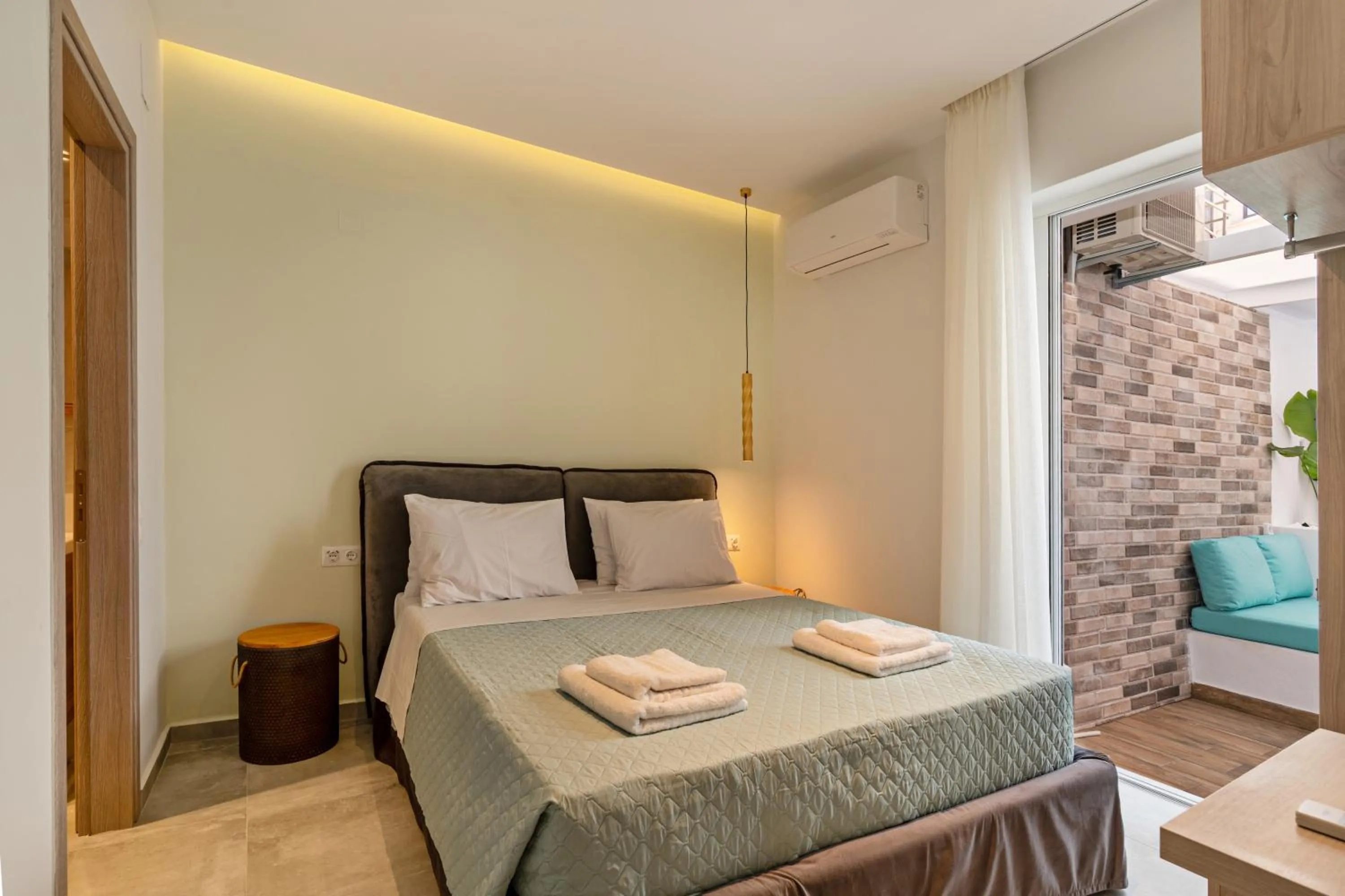 Bed in City and Sand Suites