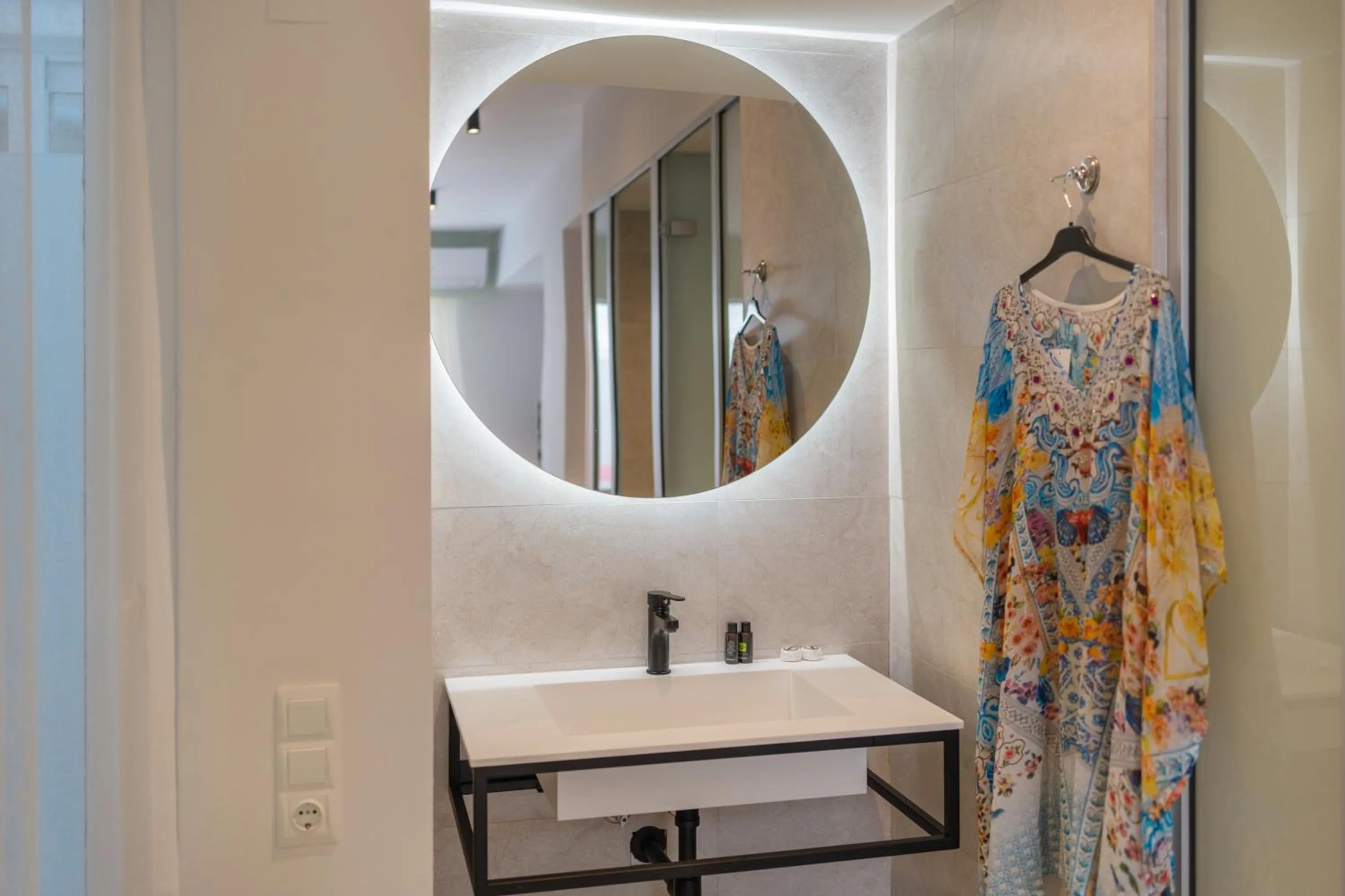Bathroom in City and Sand Suites