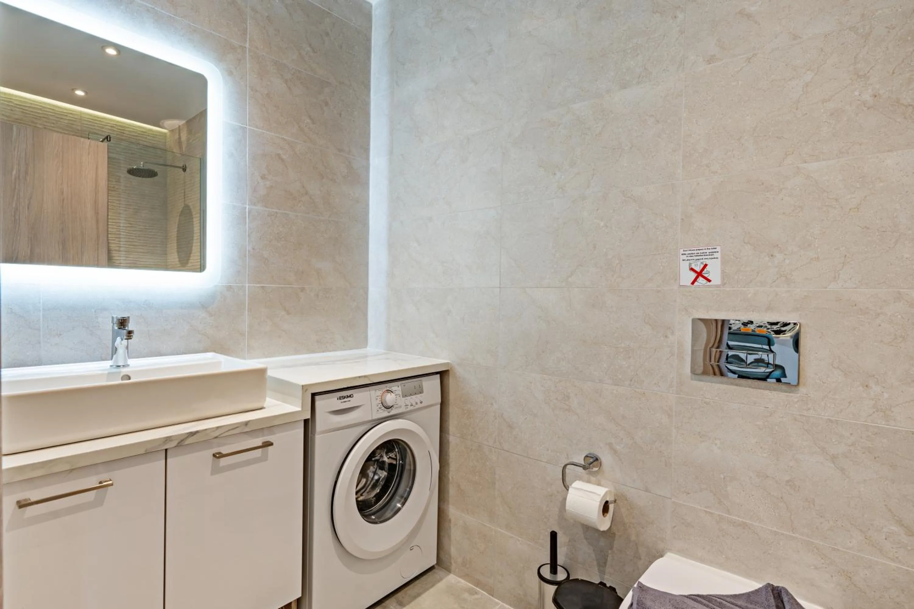 Bathroom in City and Sand Suites