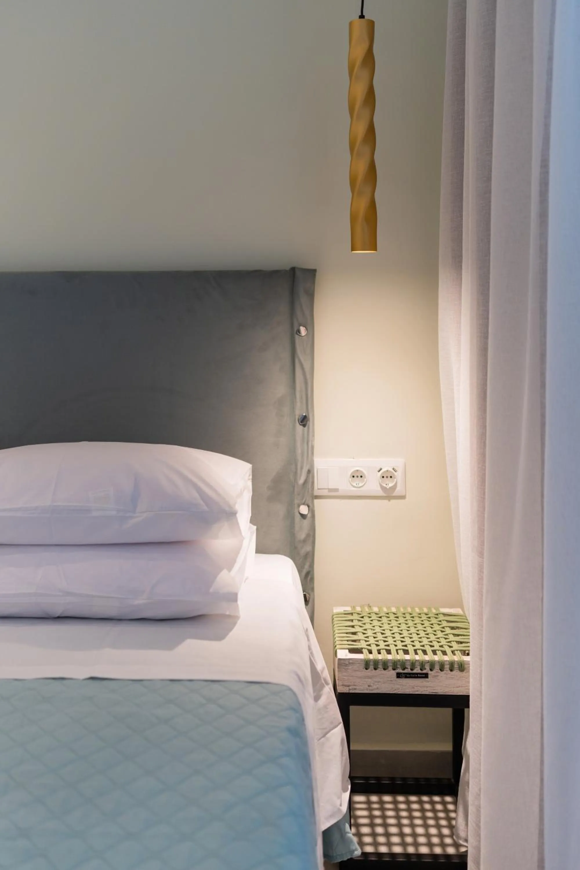 Bed in City and Sand Suites