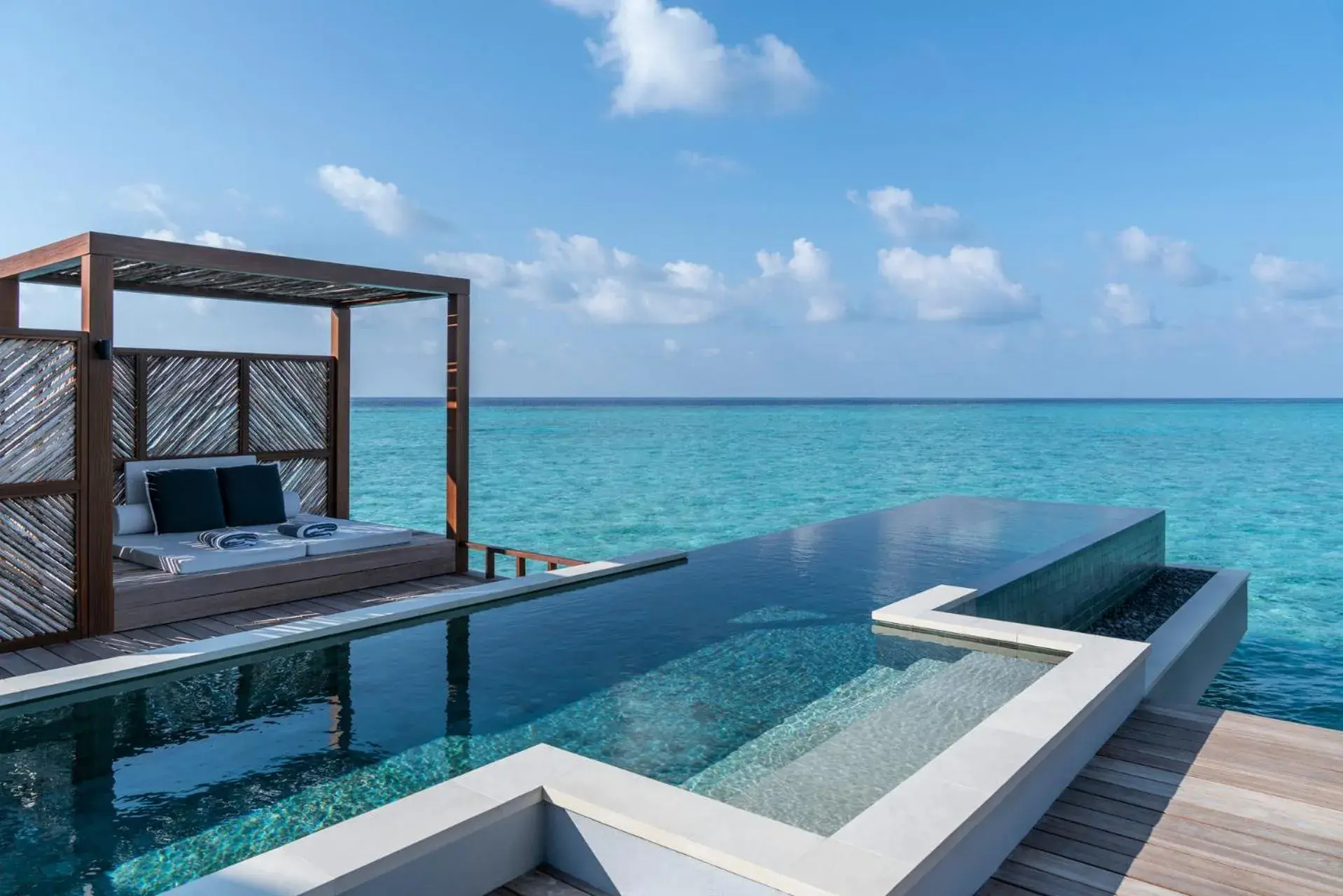 Bed in Four Seasons Resort Maldives at Landaa Giraavaru Bed in Four Seasons Resort Maldives at Landaa Giraavaru