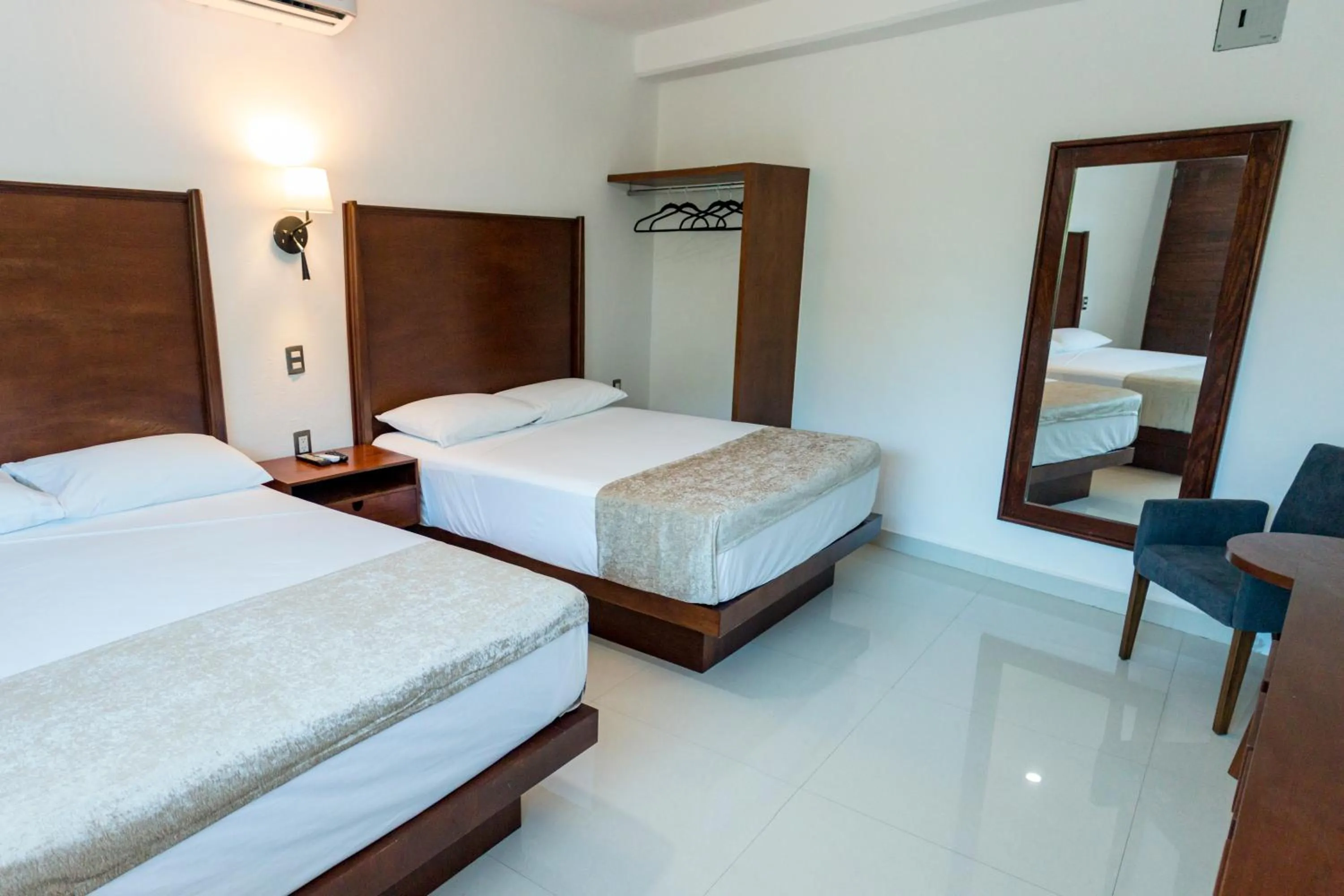 Bed in LA LOMA SUITES