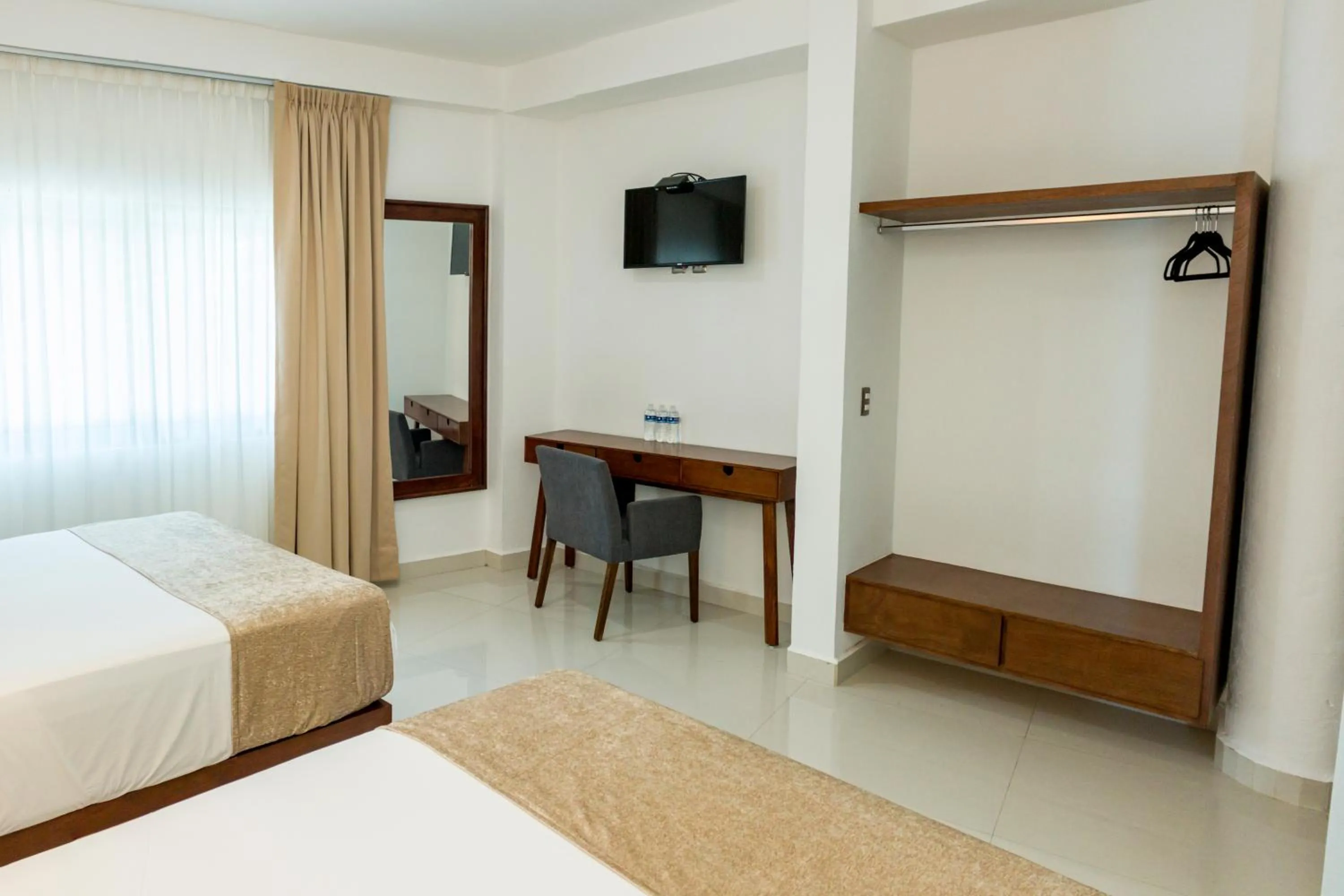 Bed in LA LOMA SUITES
