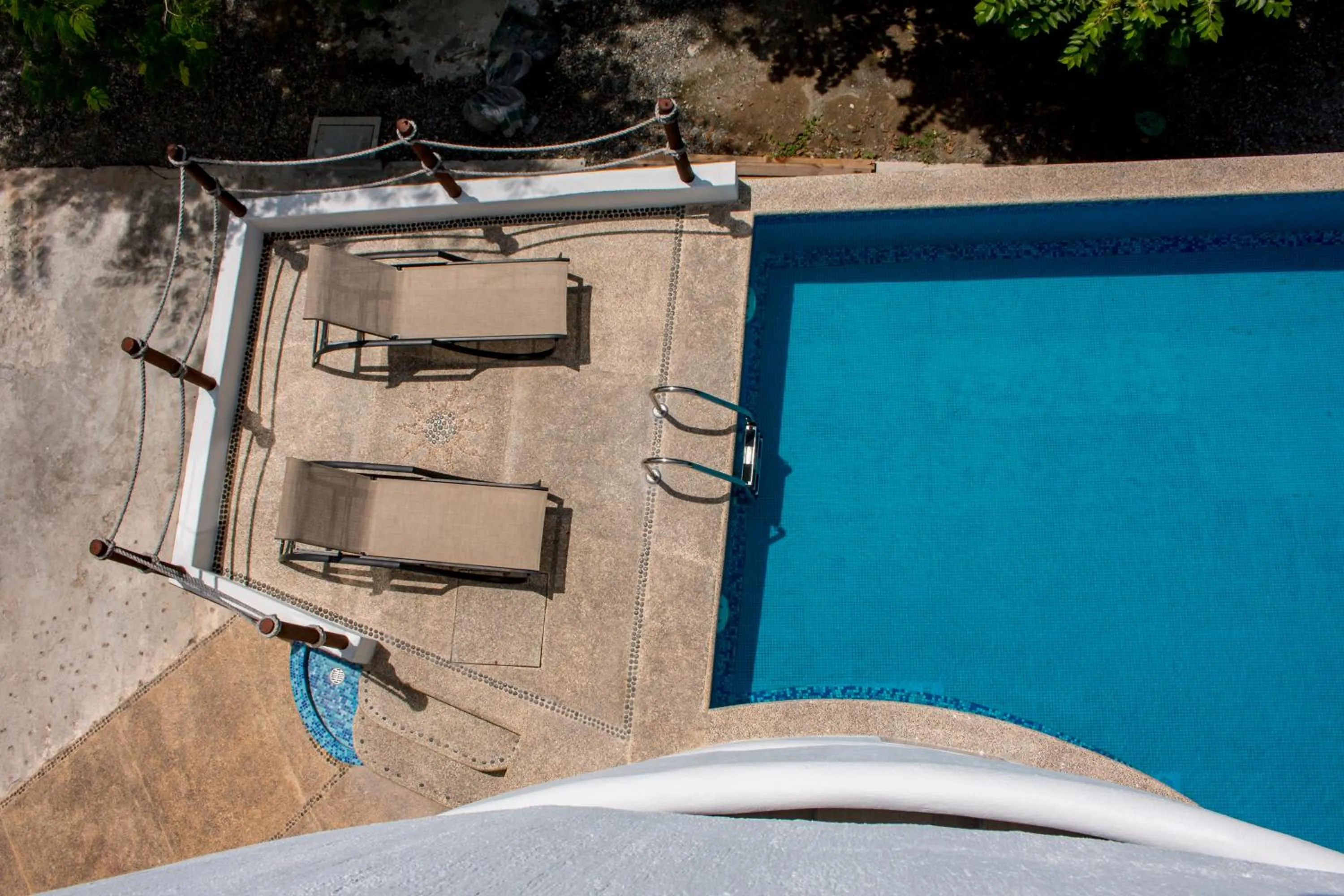 Swimming pool in LA LOMA SUITES