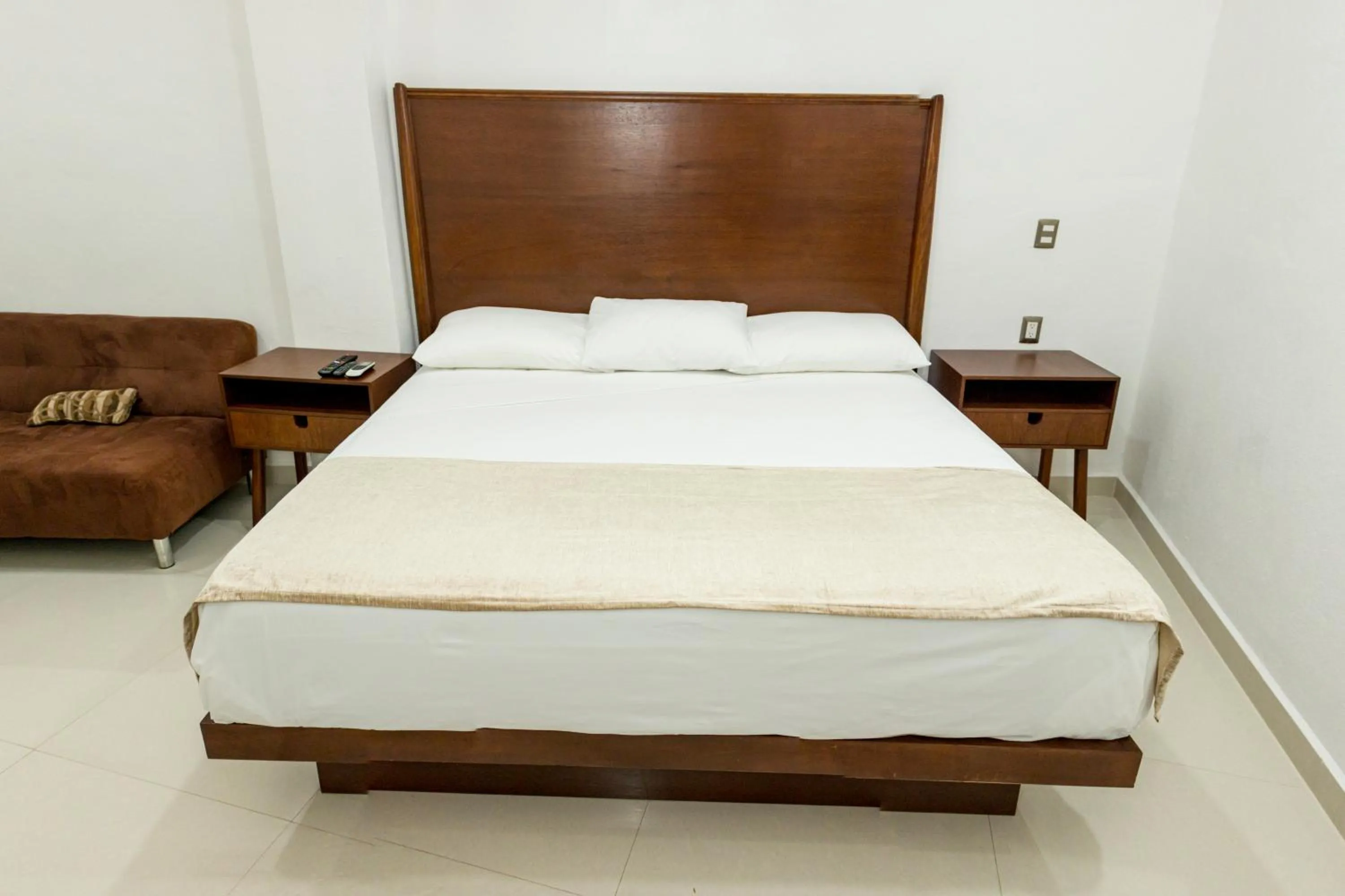 Bed in LA LOMA SUITES