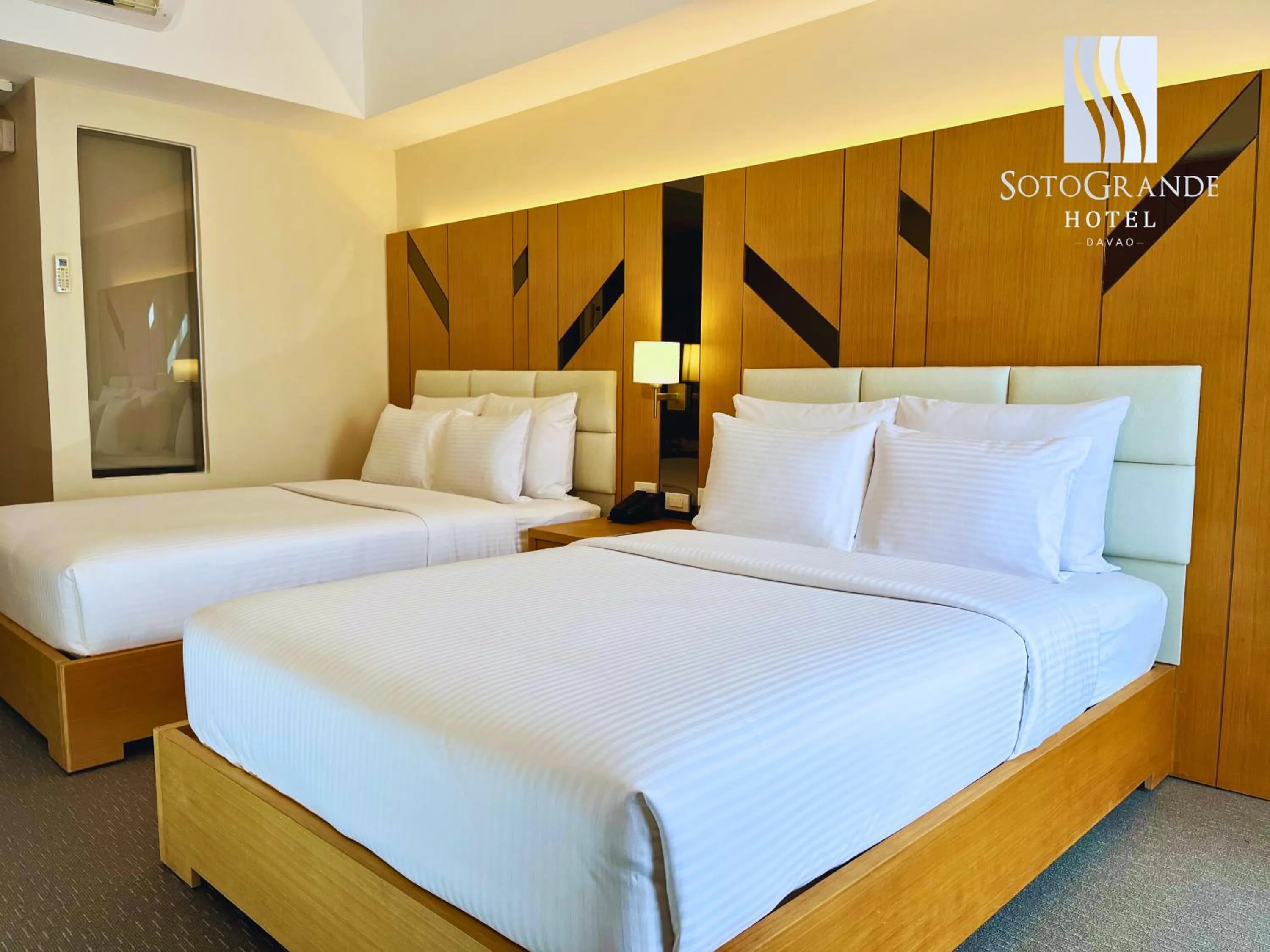 Bed in Sotogrande Davao Hotel