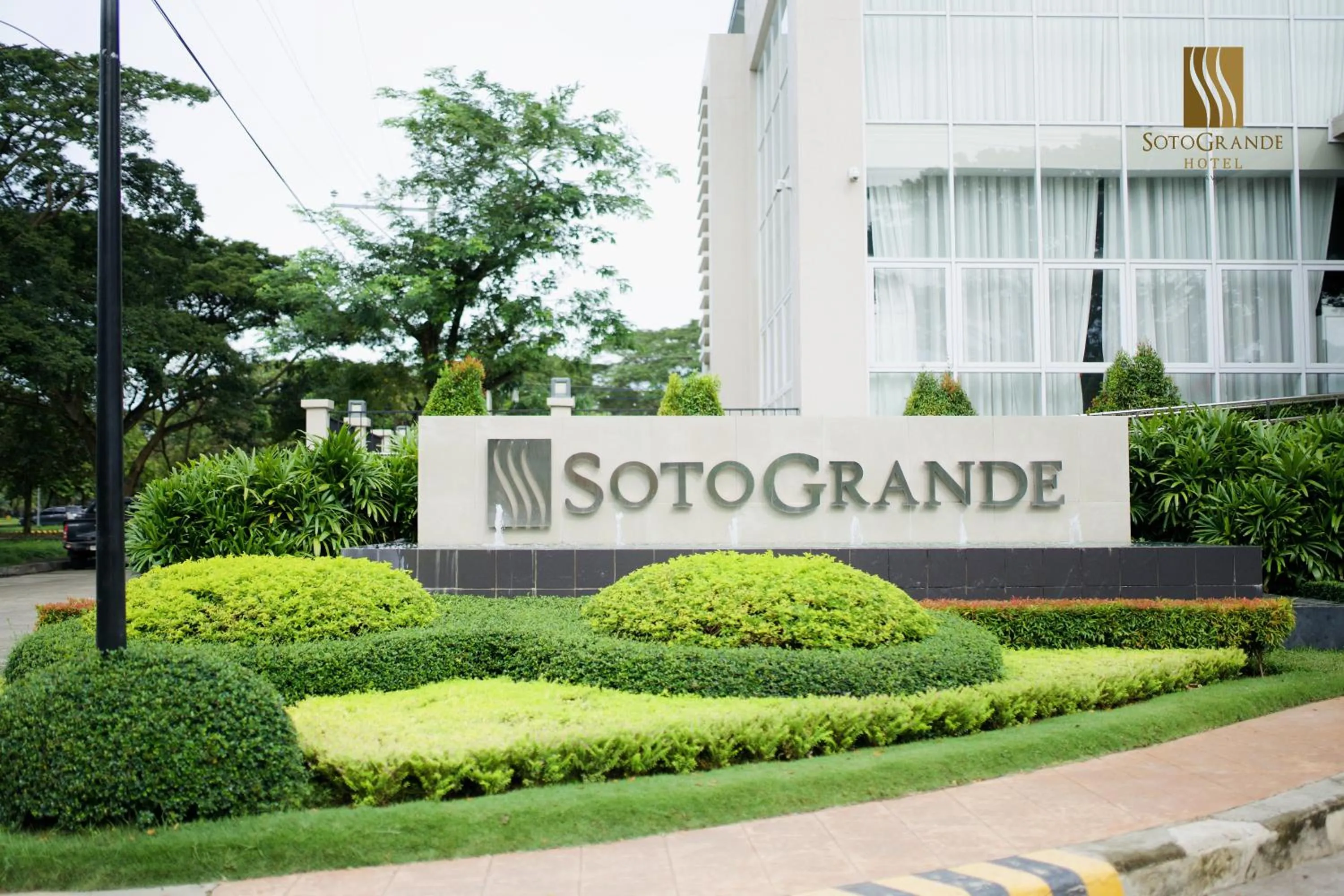 Property logo or sign in Sotogrande Davao Hotel