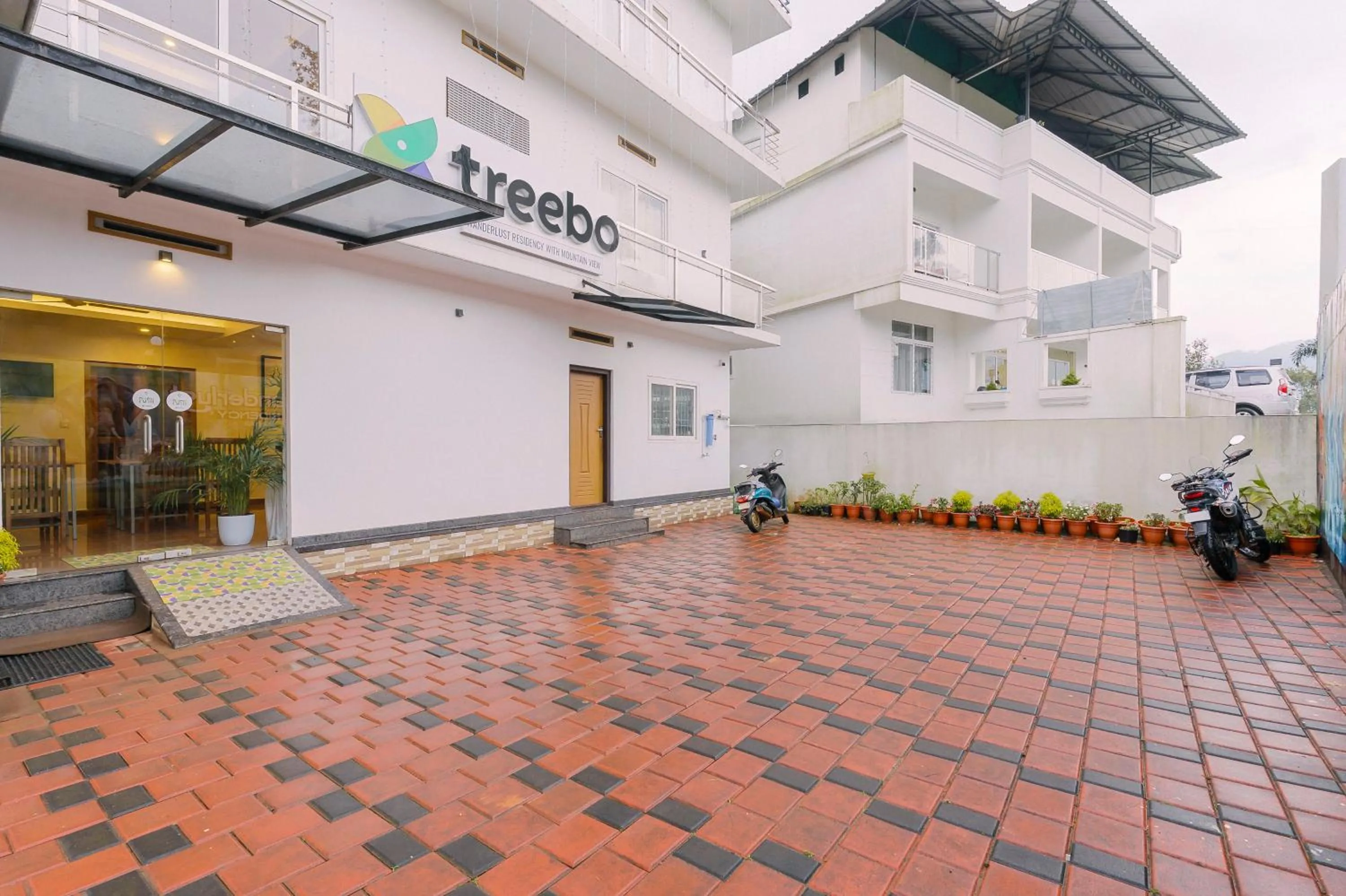 Parking in Treebo Wanderlust Residency With Mountain View