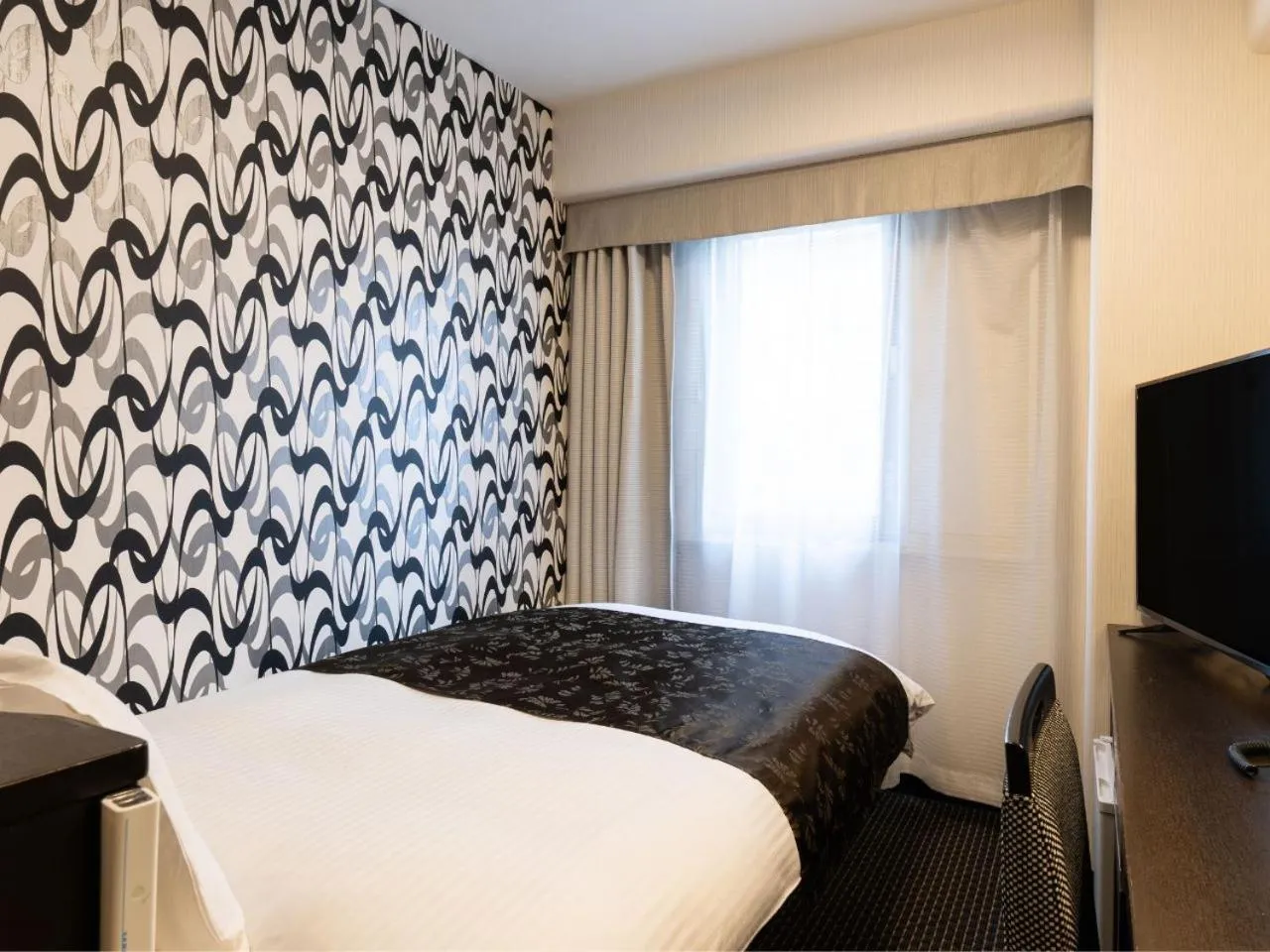 Bed in APA Hotel Nambakita Shinsaibashi Ekimae