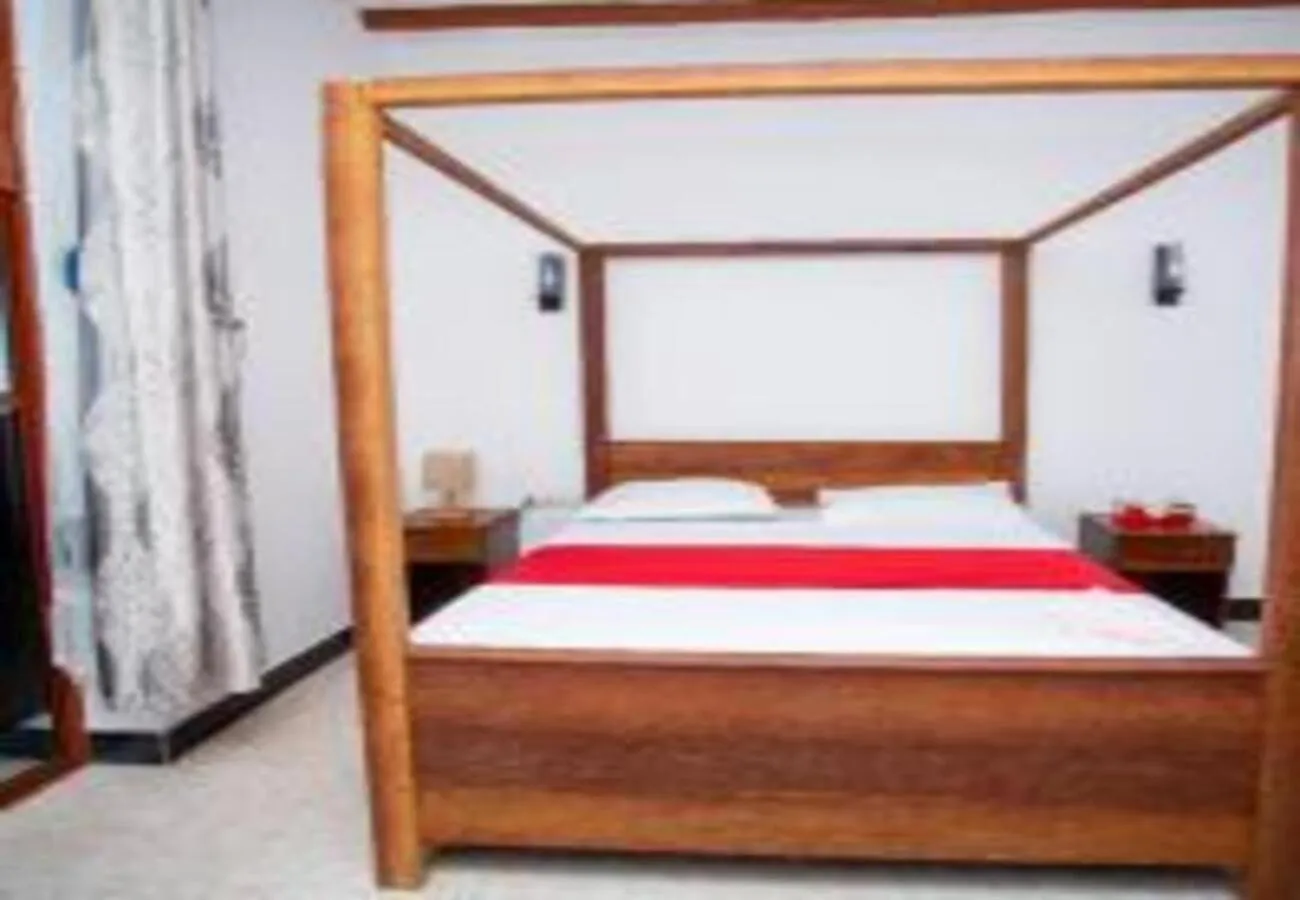 Bed in Utulivu Bungalow