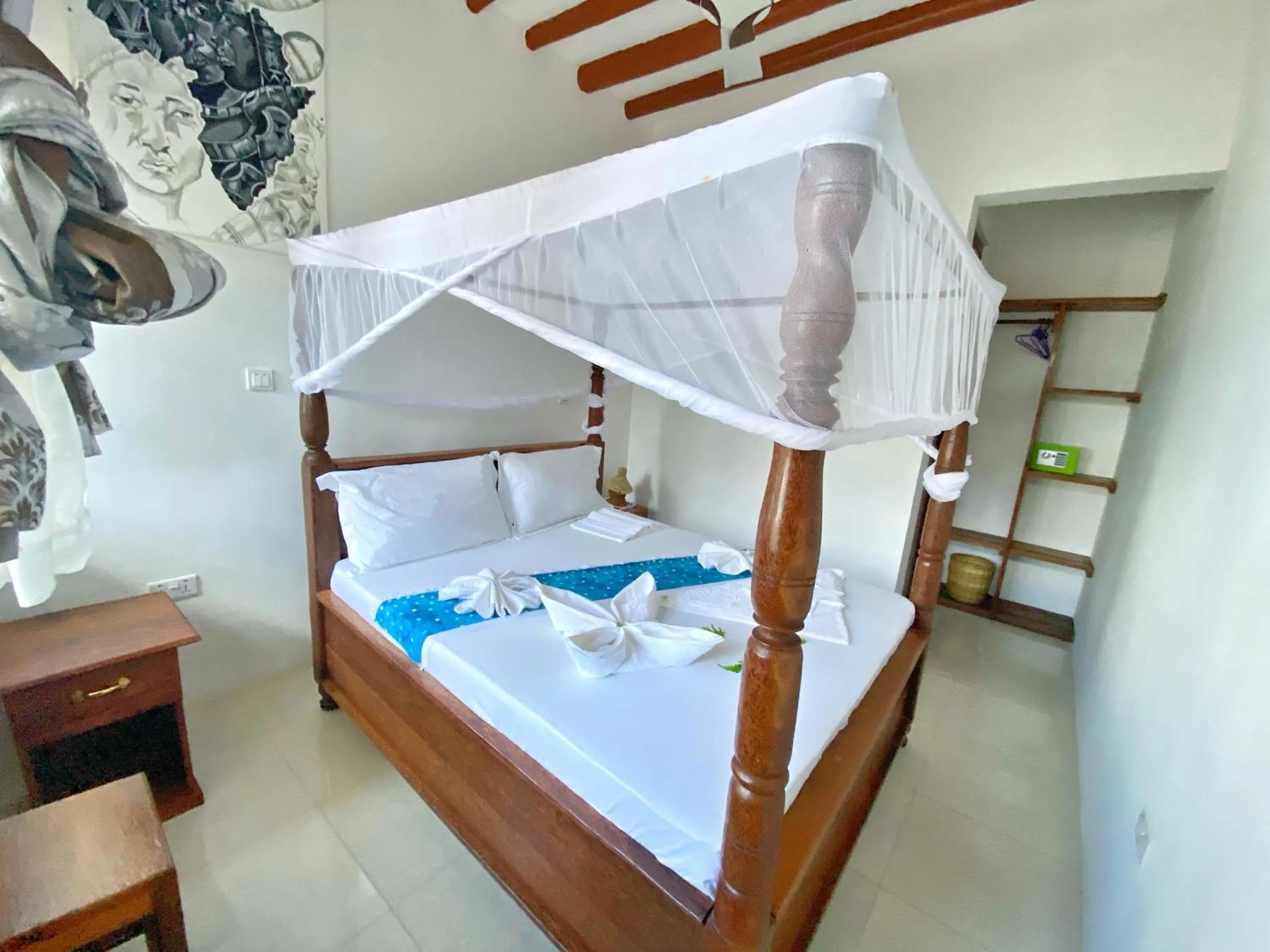 Bed in Utulivu Bungalow