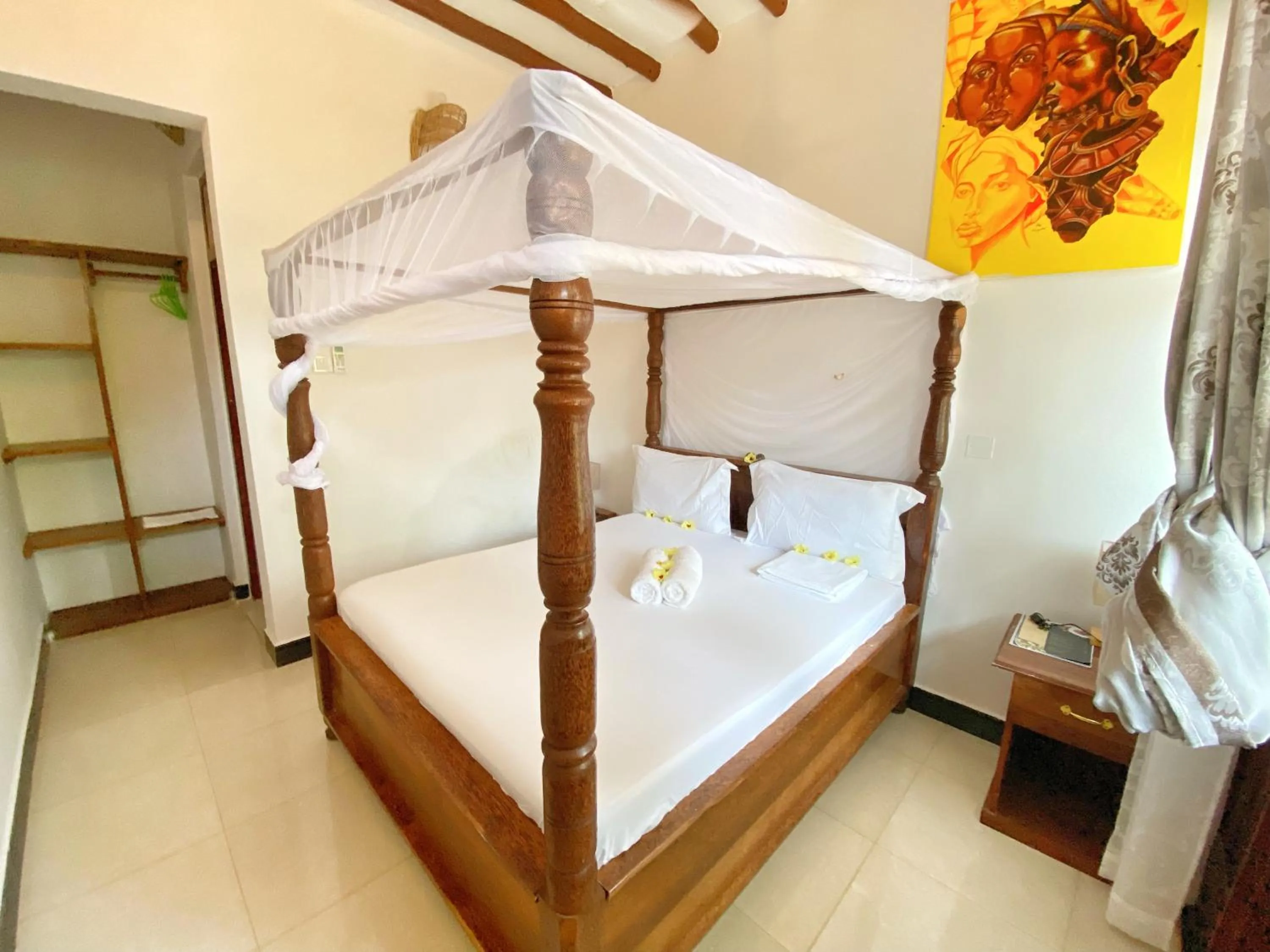 Bed in Utulivu Bungalow