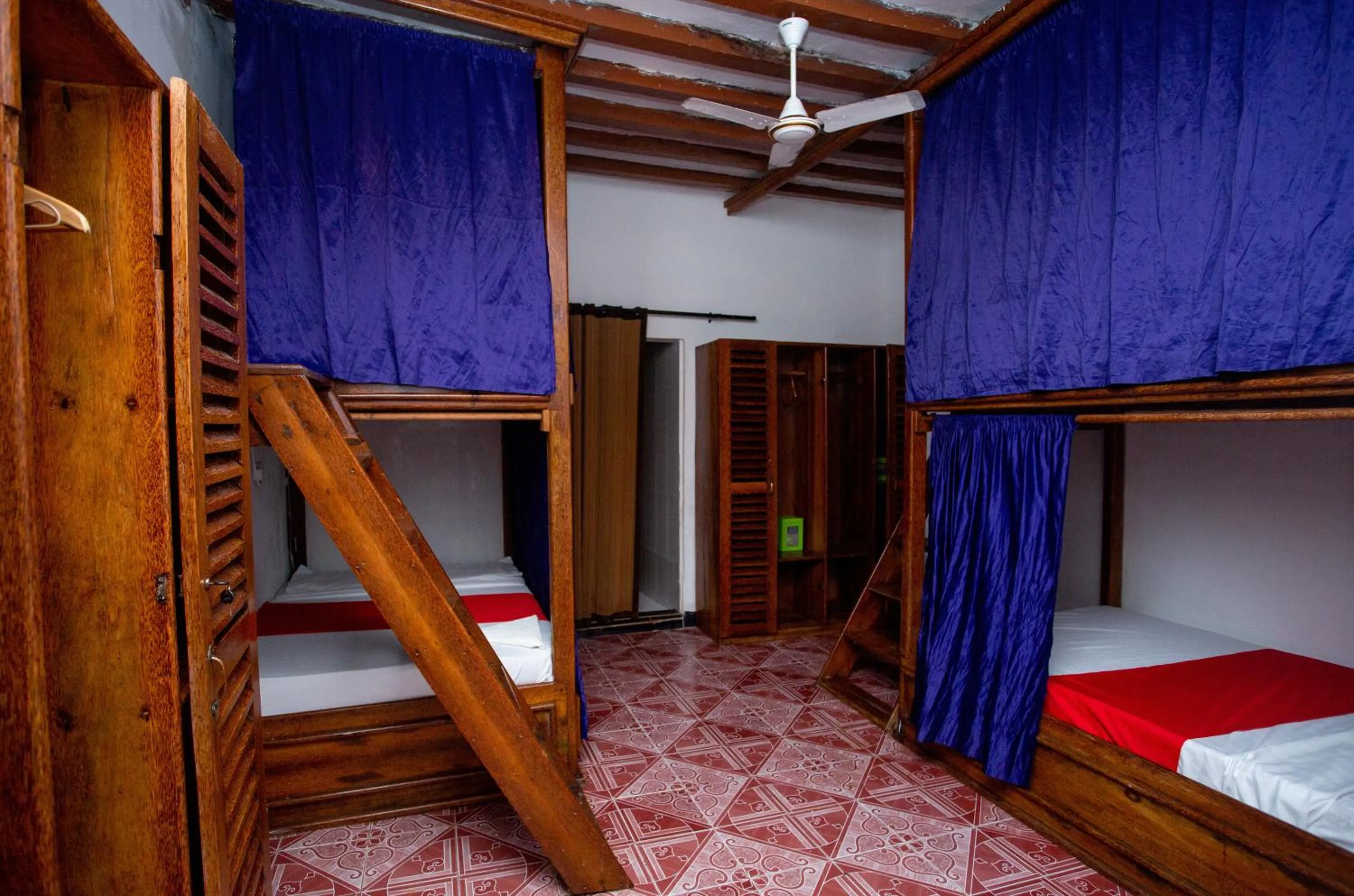 Toilet, Bed in Utulivu Bungalow