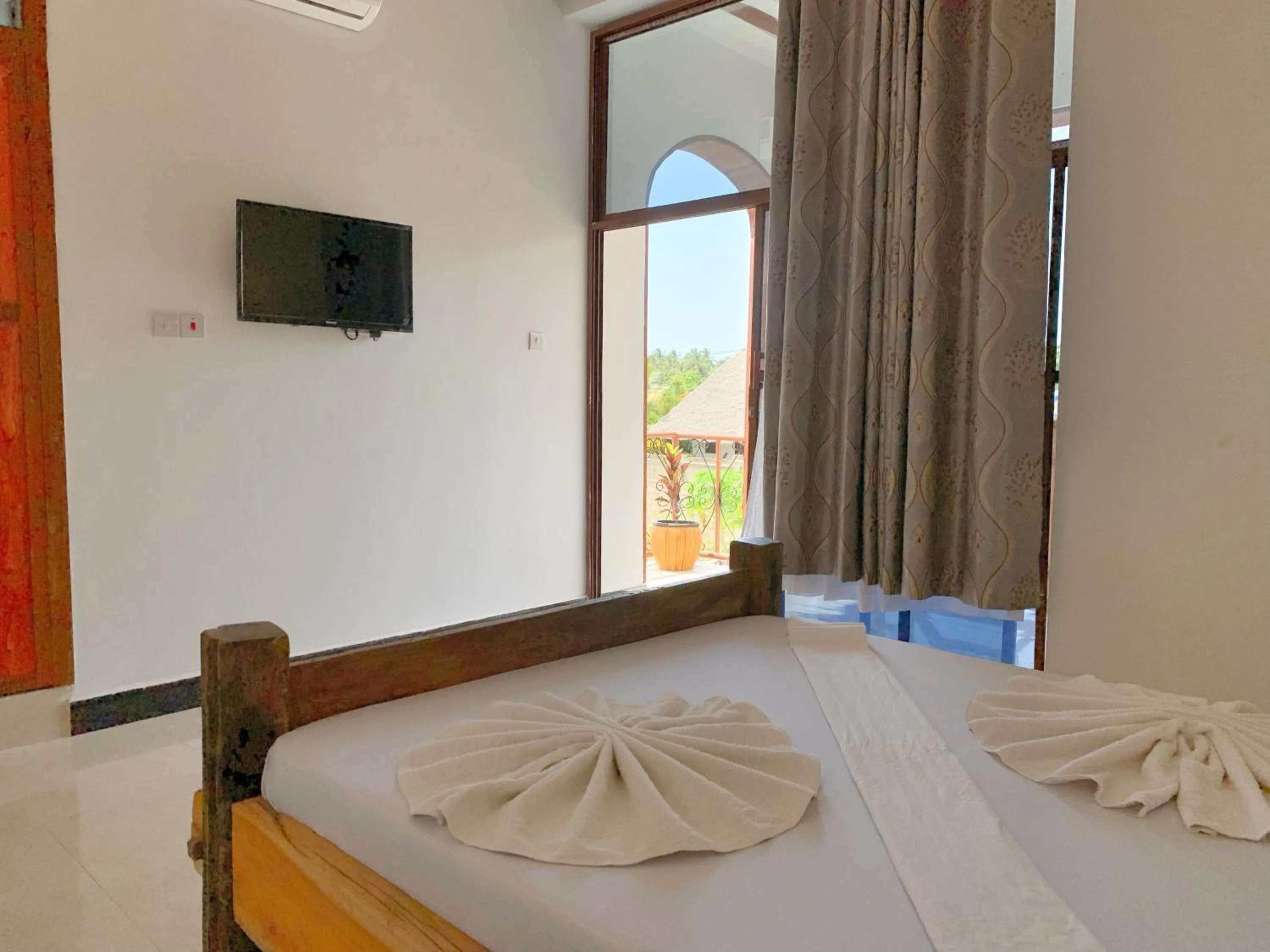 Bed in Utulivu Bungalow