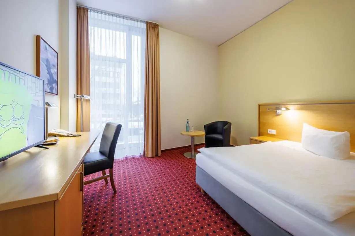 Photo of the whole room, Bed in Airporthotel Berlin-Adlershof Photo of the whole room, Bed in Airporthotel Berlin-Adlershof