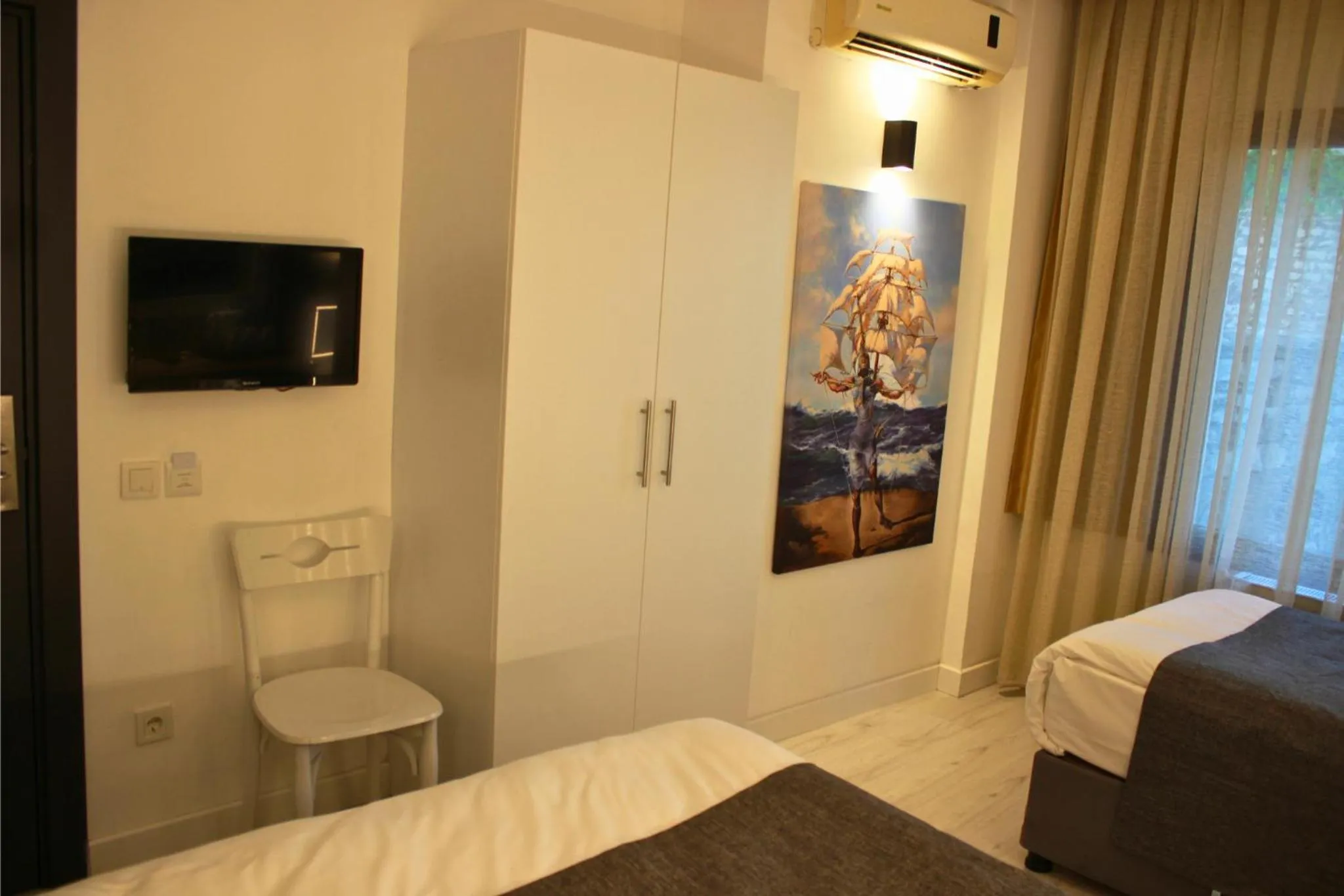 TV and multimedia, Bed in Hotel Peninsula