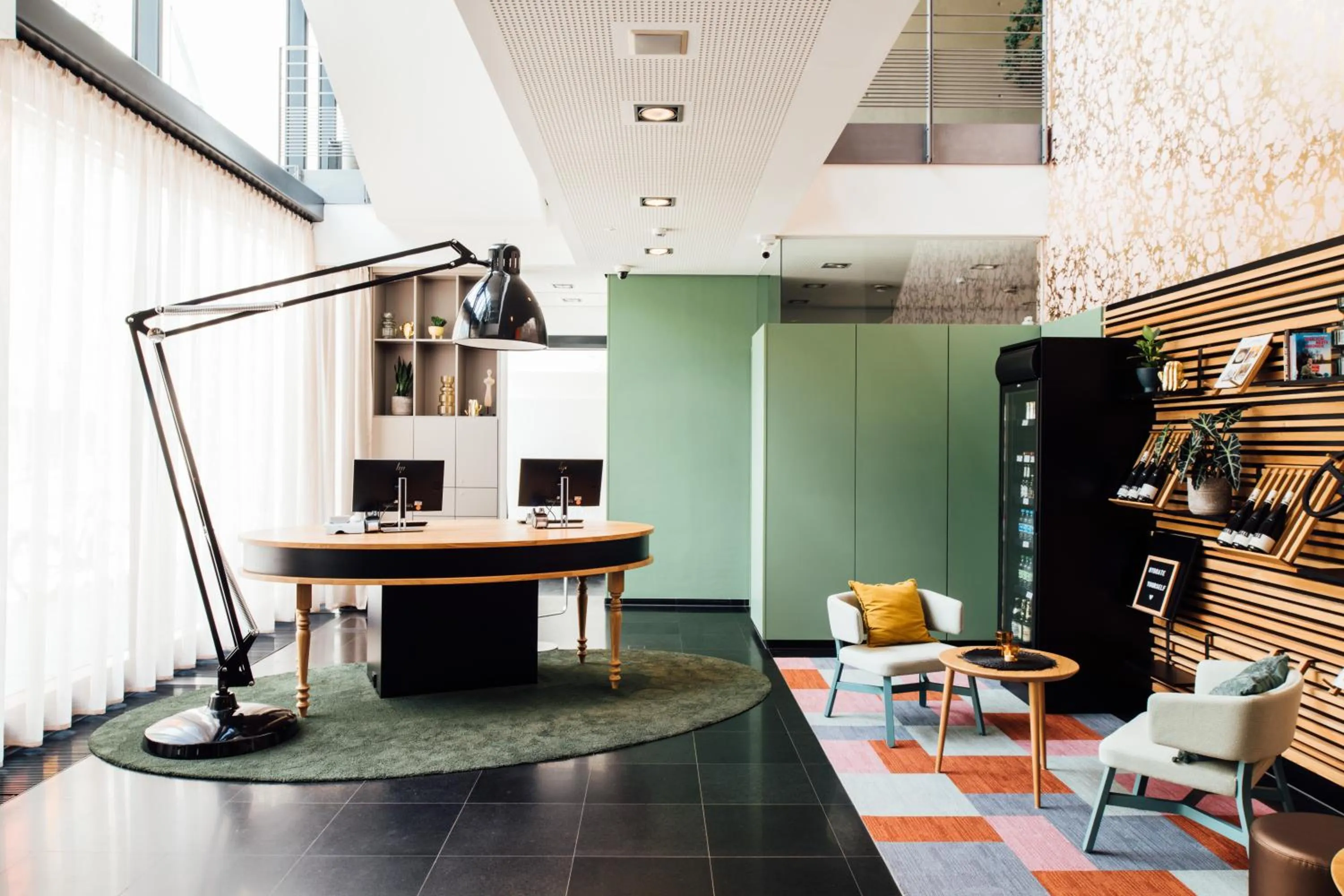 Lobby or reception in Vienna House Easy by Wyndham Stuttgart