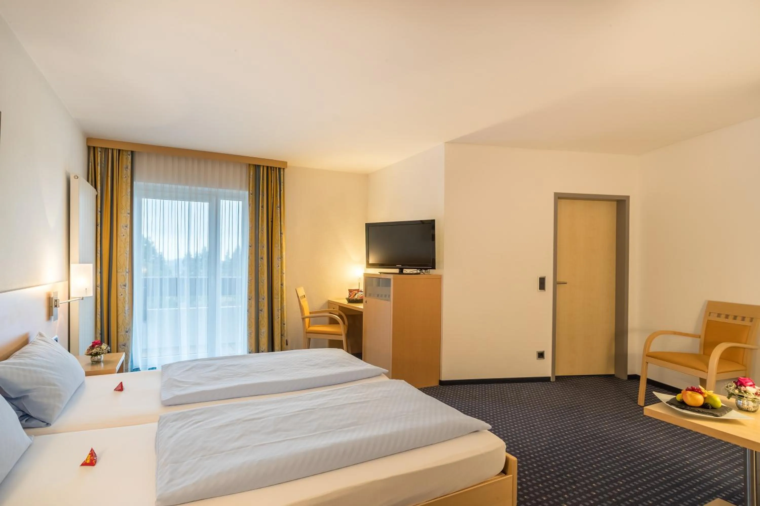 Photo of the whole room, Bed in Sporthotel Grünberg