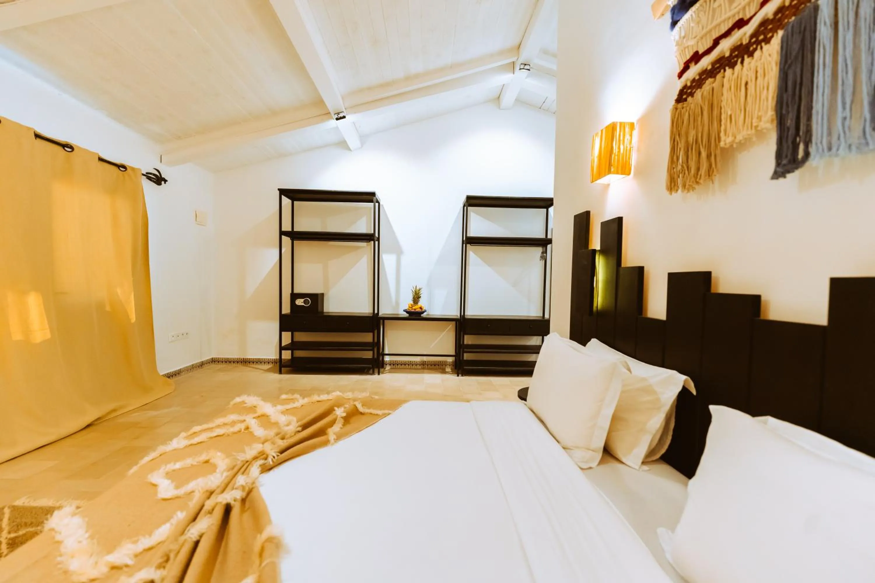 Photo of the whole room, Bed in Dakhla Attitude