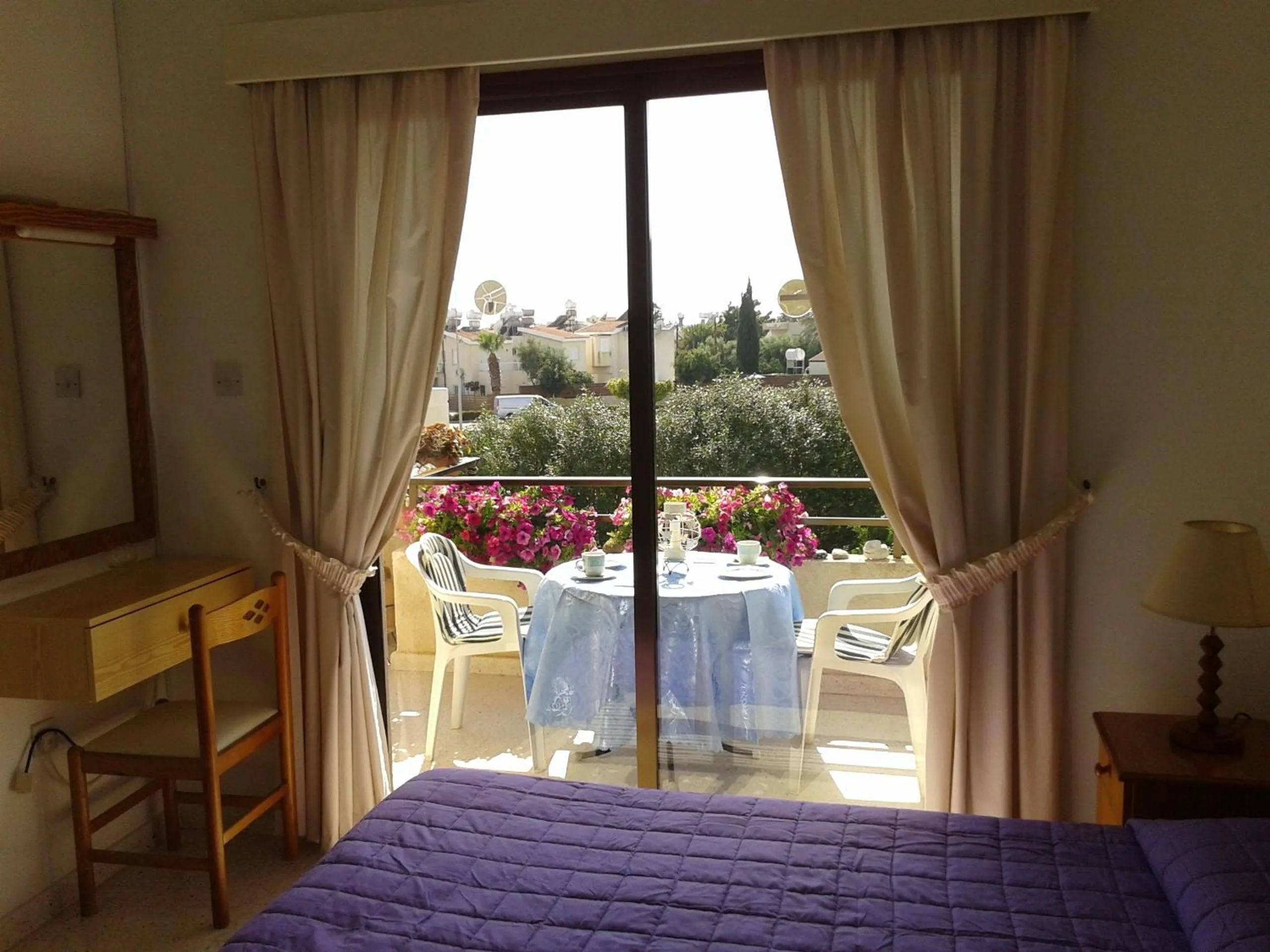 Bed in Arilena Holiday Apartments