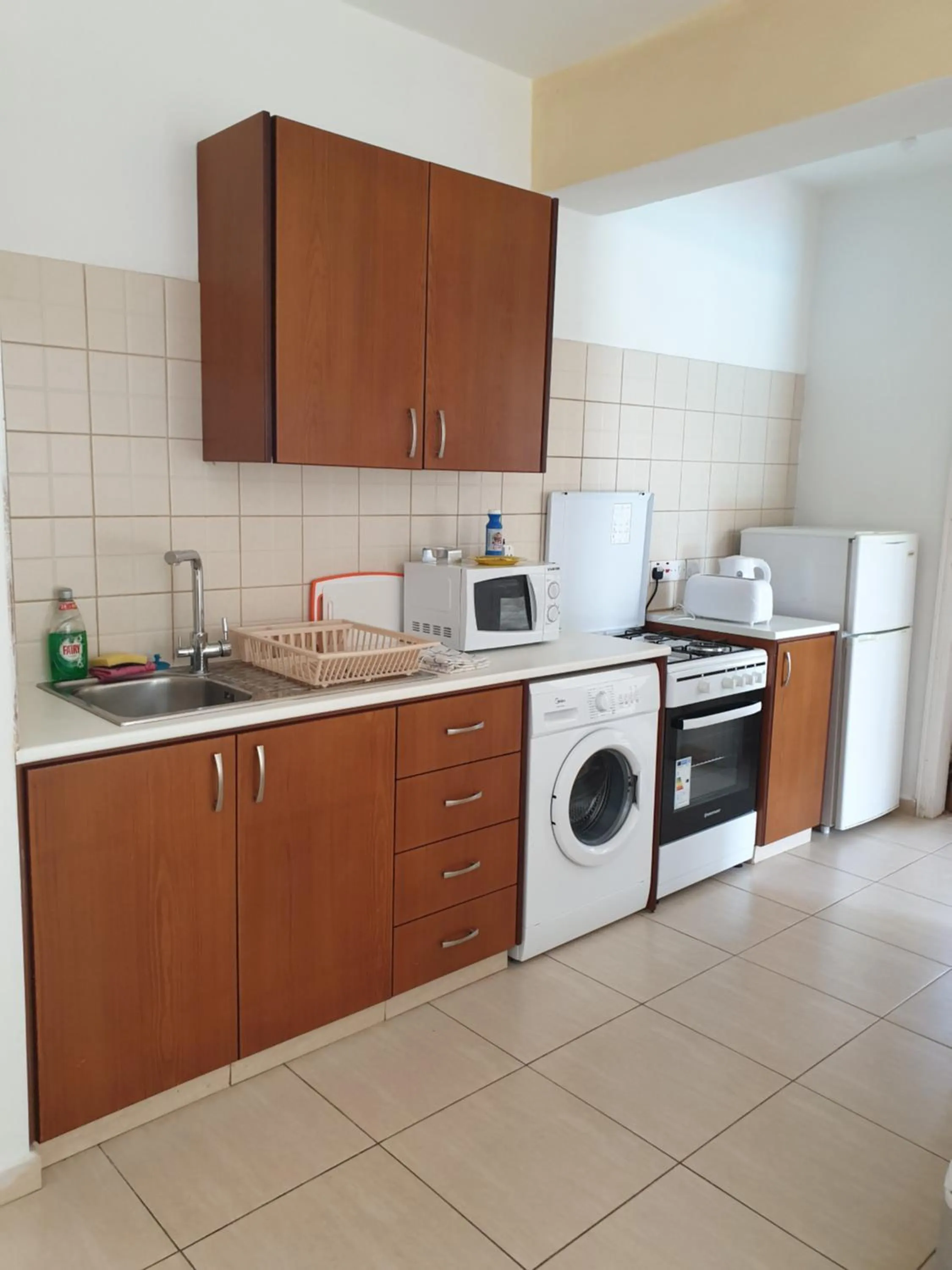 Communal kitchen in Arilena Holiday Apartments