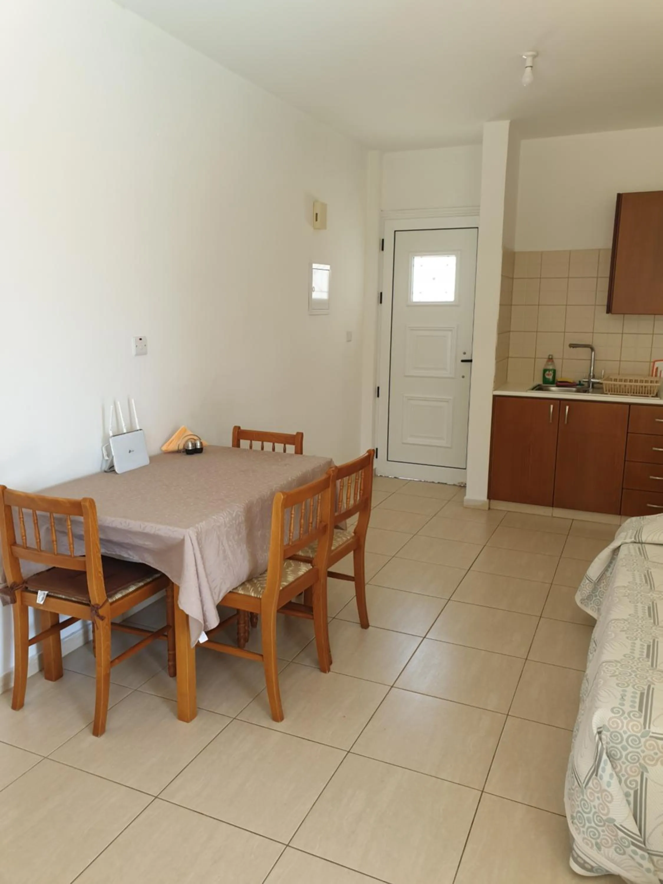 Dining area in Arilena Holiday Apartments