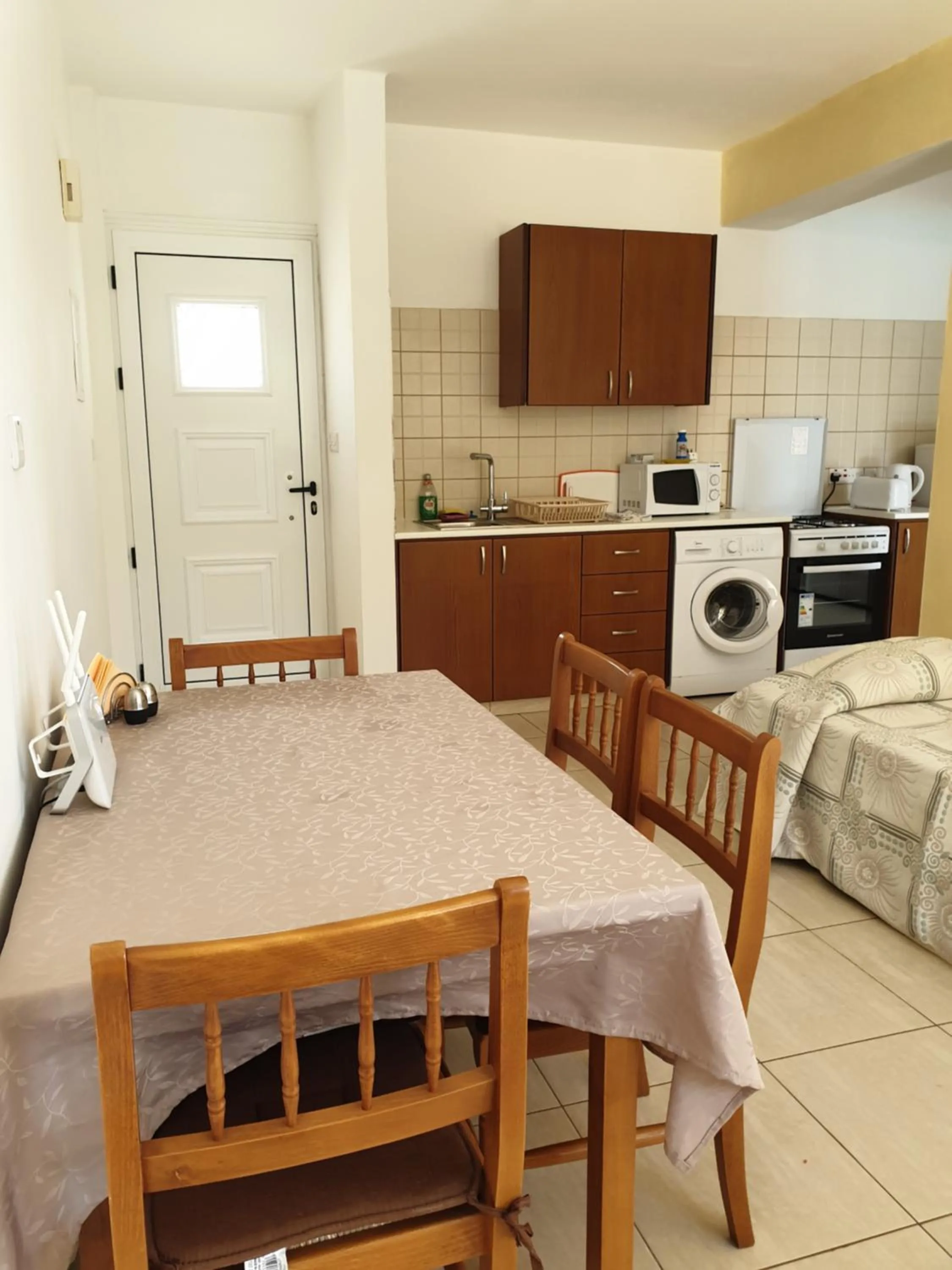 Dining area in Arilena Holiday Apartments