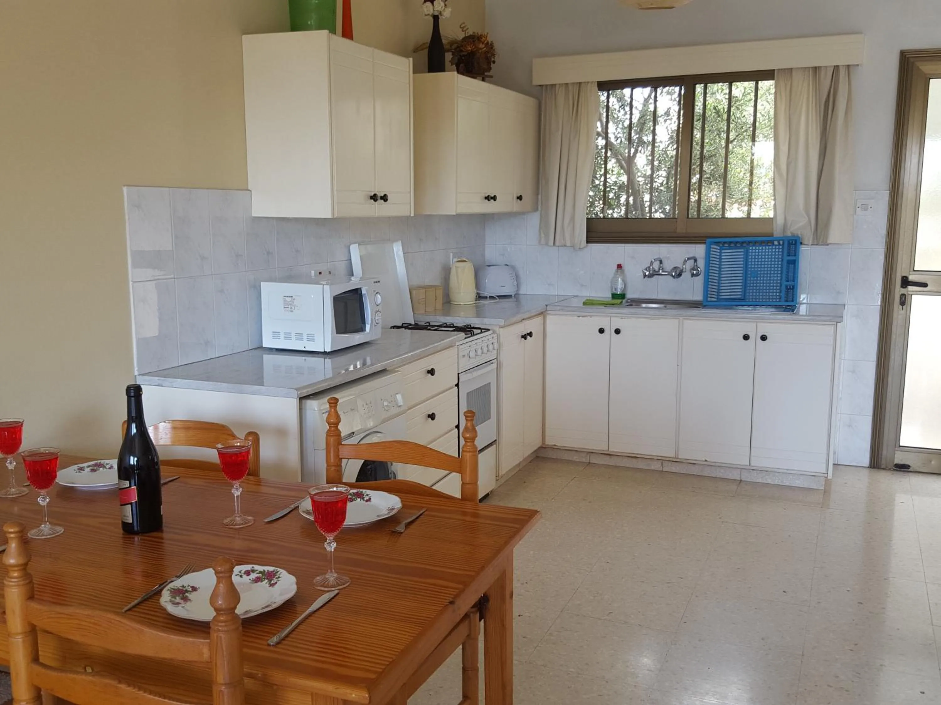 Kitchen or kitchenette in Arilena Holiday Apartments