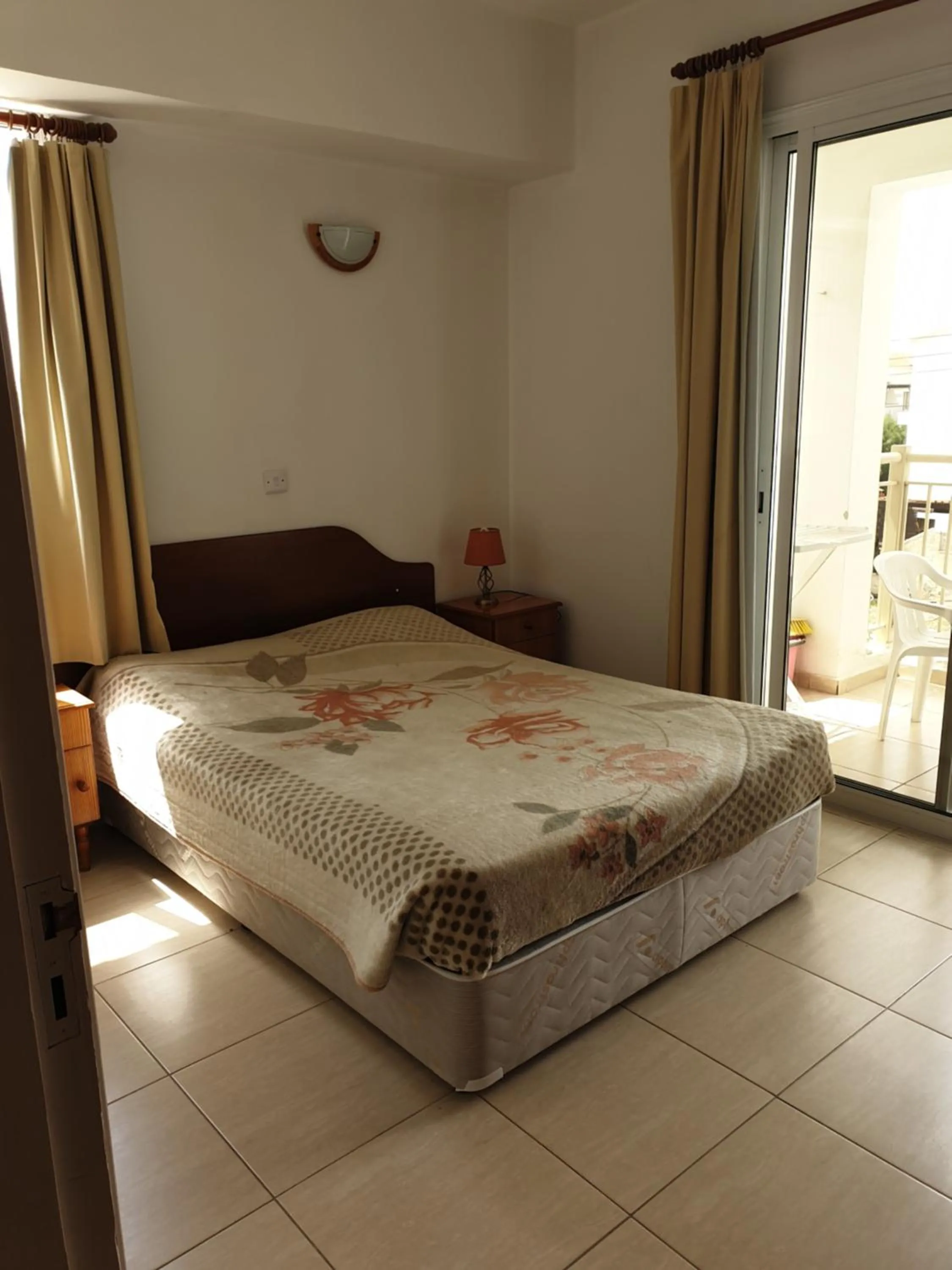 Bed in Arilena Holiday Apartments