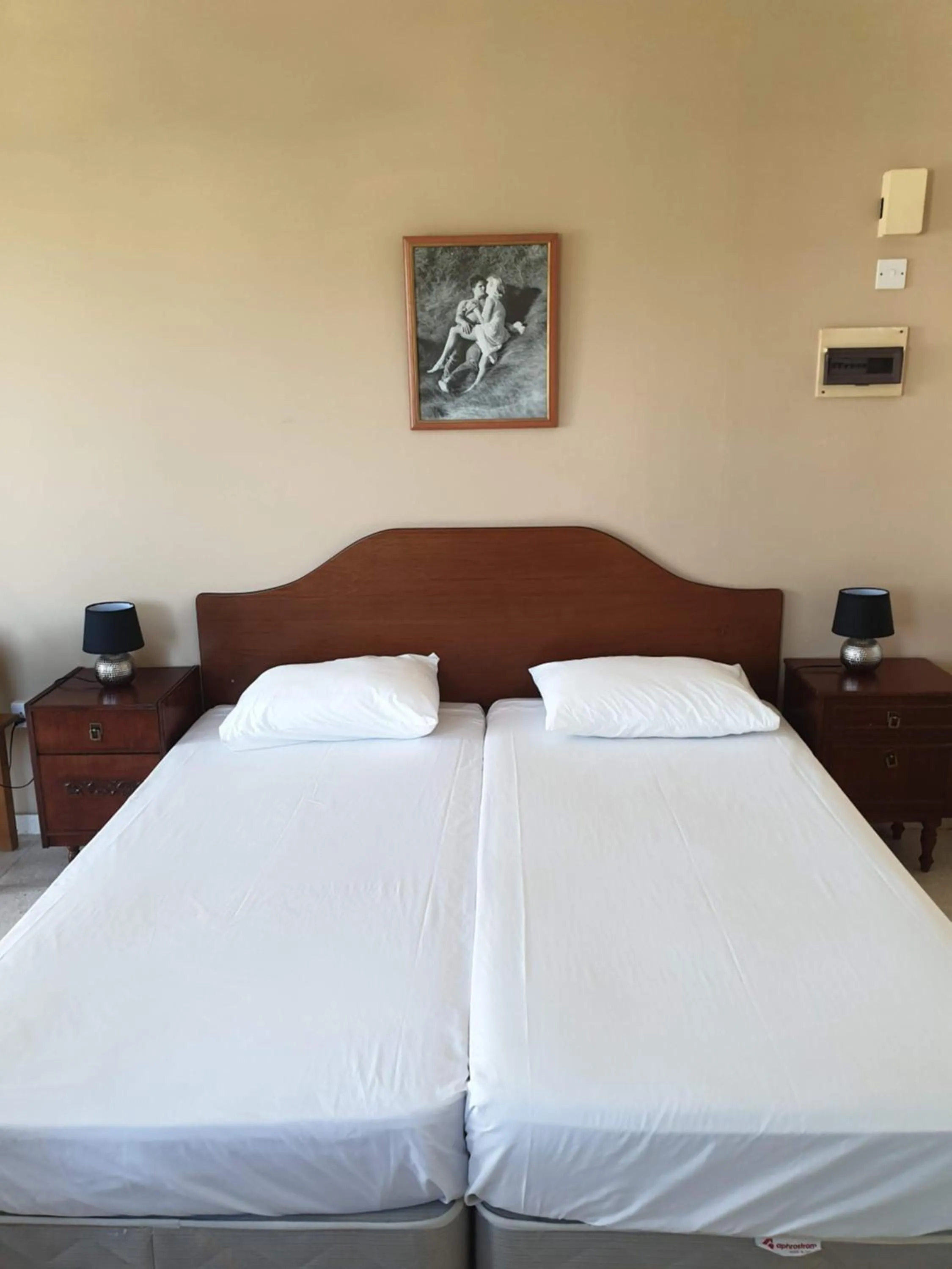 Bed in Arilena Holiday Apartments