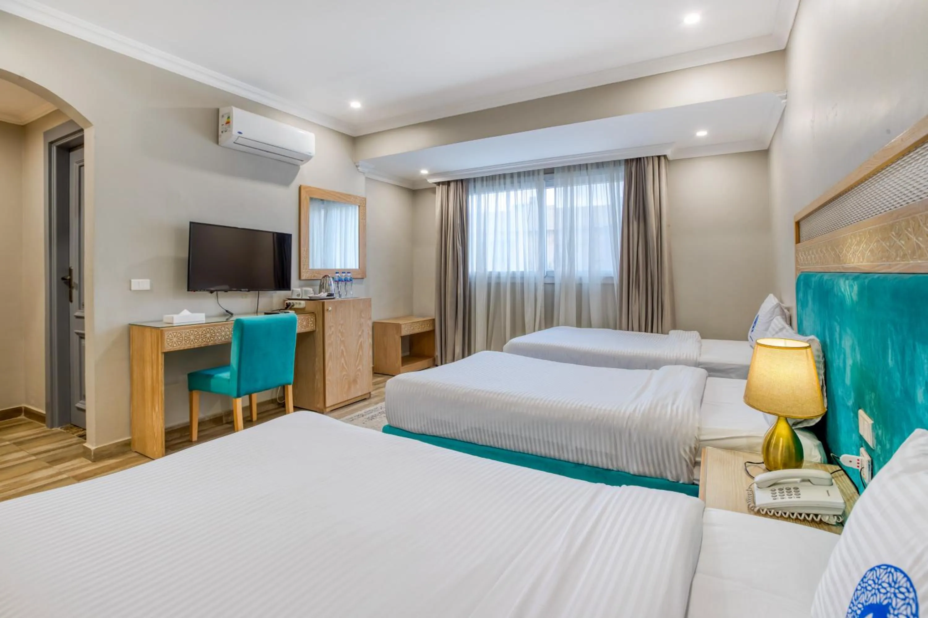 Bed in Mamlouk Pyramids Hotel