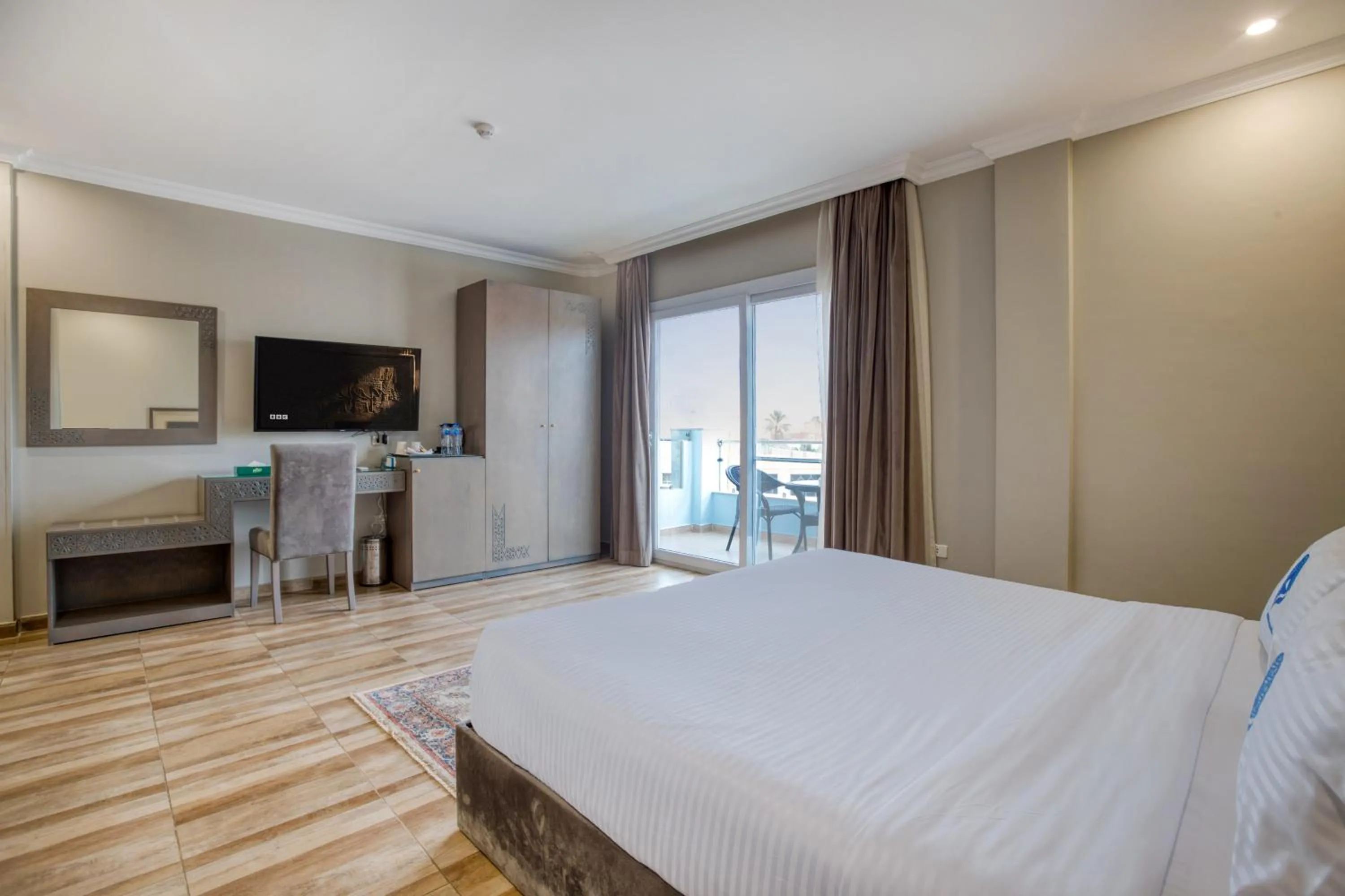 Bed in Mamlouk Pyramids Hotel