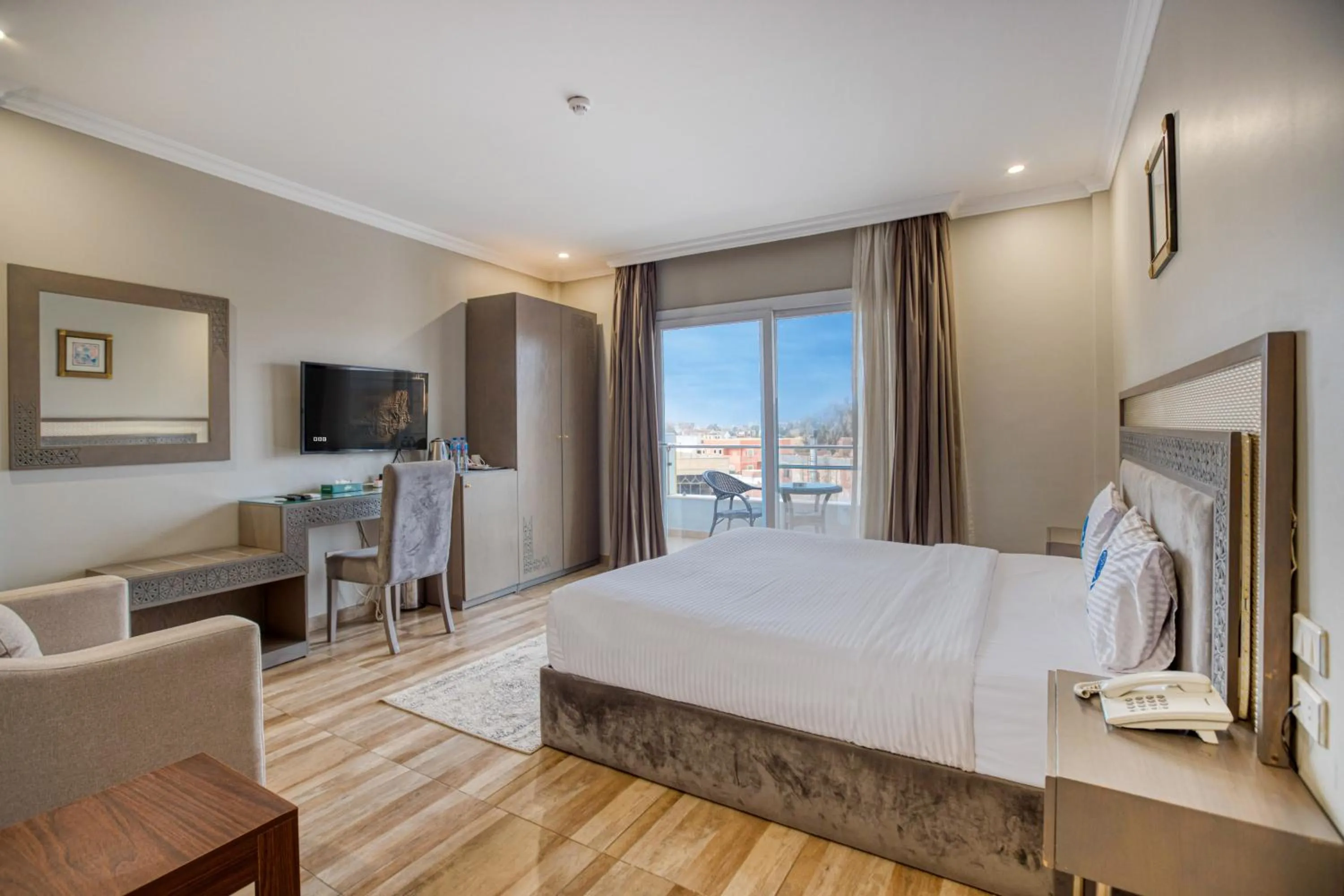 Bed in Mamlouk Pyramids Hotel