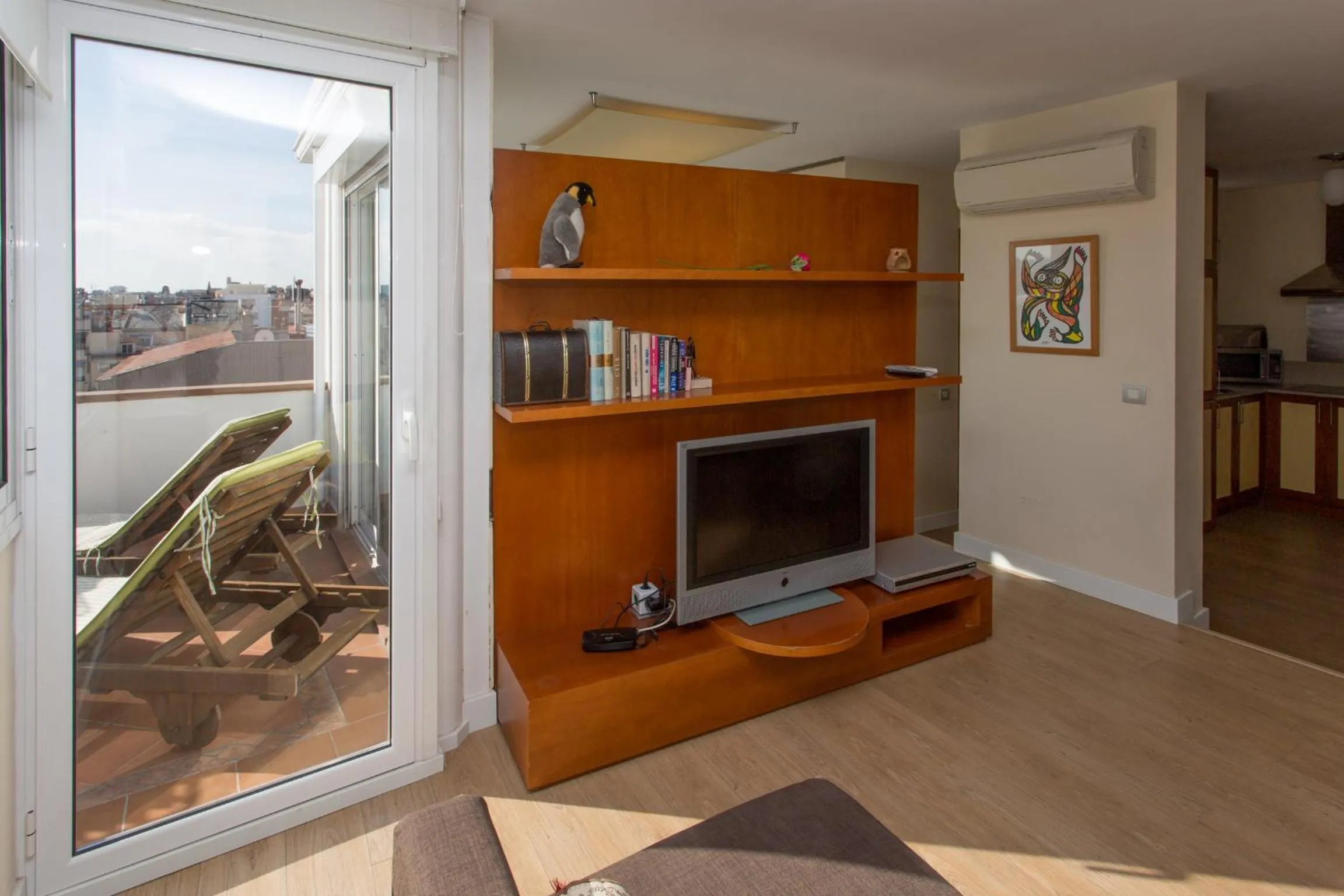 Day in Gaudi penthouse with terrace views