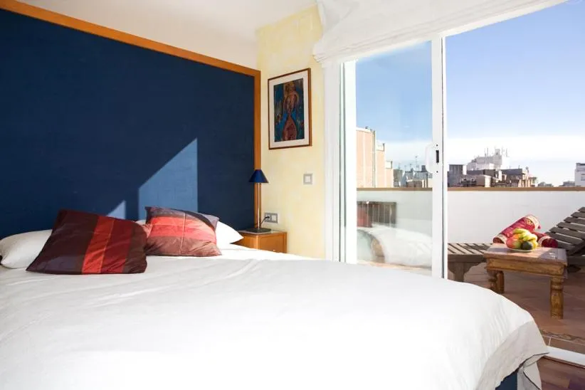Bedroom, Bed in Gaudi penthouse with terrace views