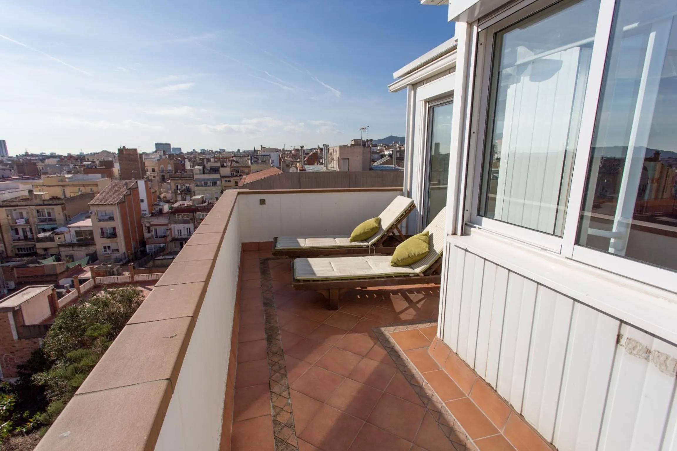 Day in Gaudi penthouse with terrace views