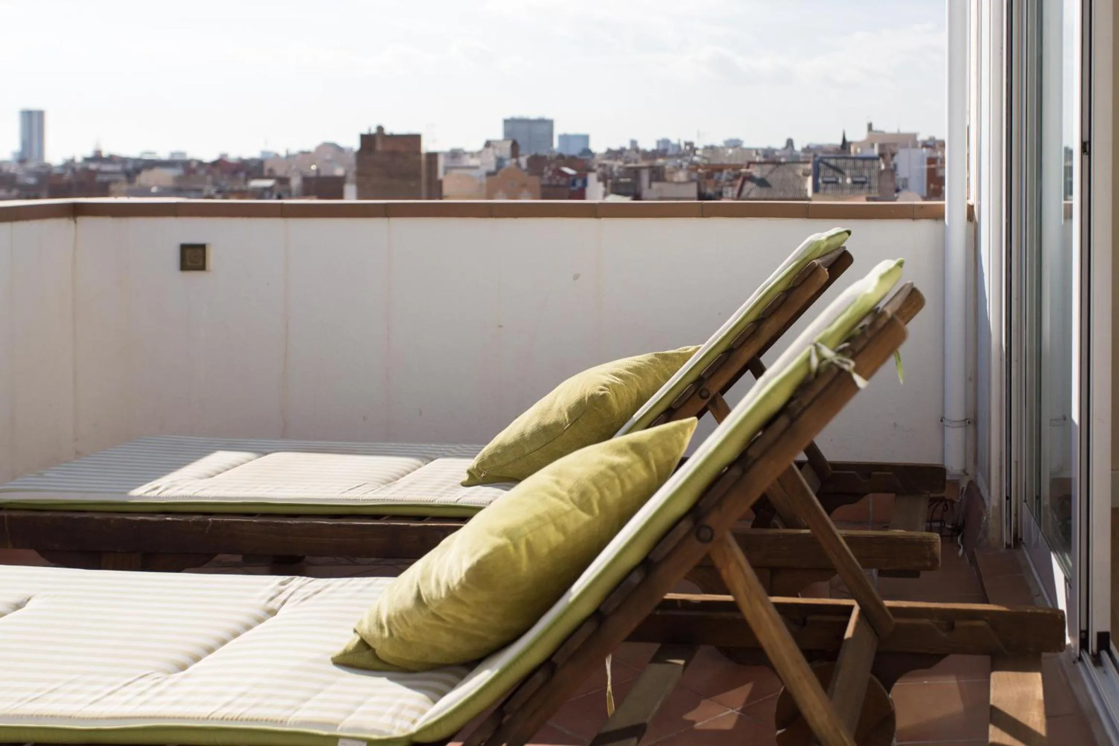 Day in Gaudi penthouse with terrace views
