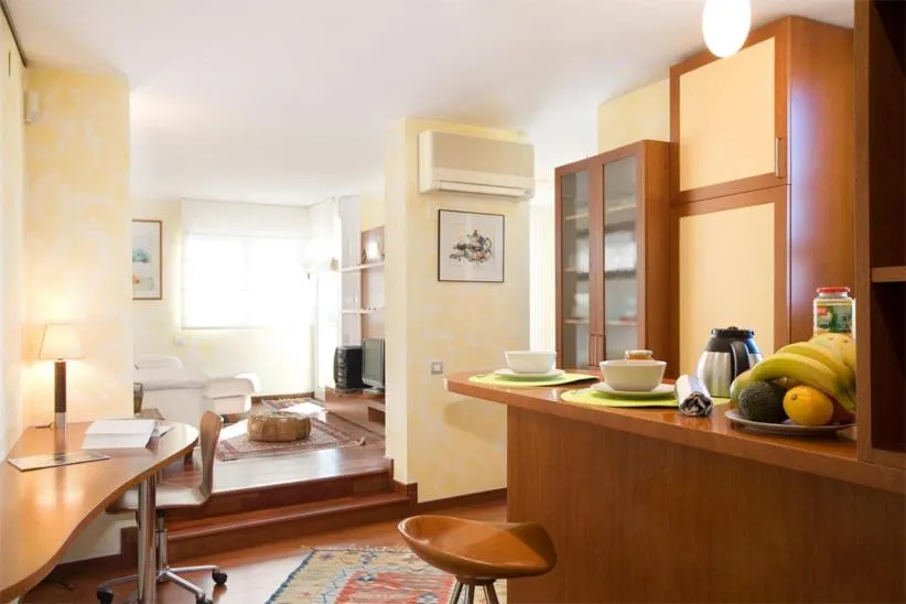 Dining area in Gaudi penthouse with terrace views