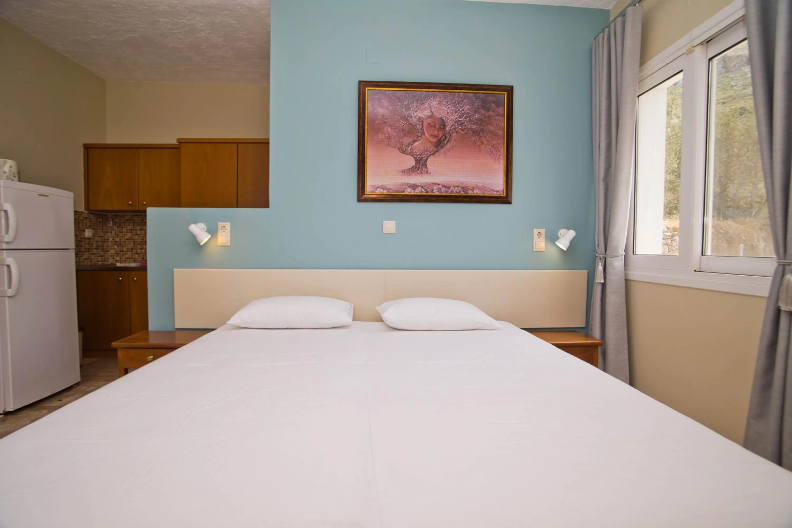 Bed in Acropolis Hotel