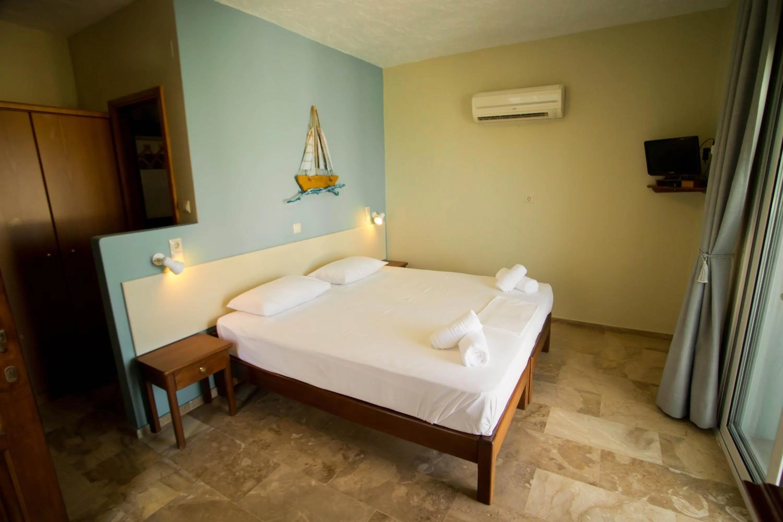 Bed in Acropolis Hotel