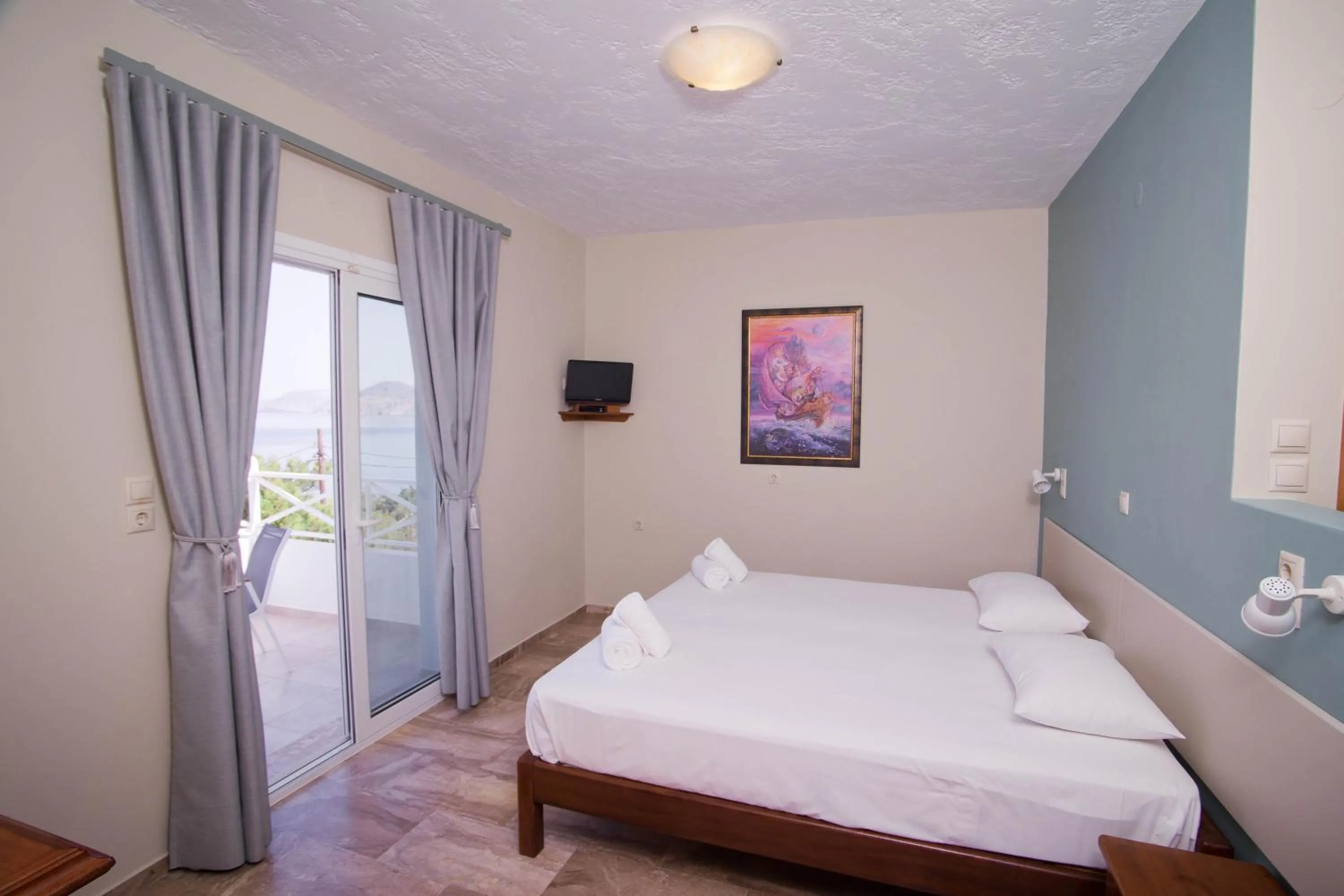 Bed in Acropolis Hotel