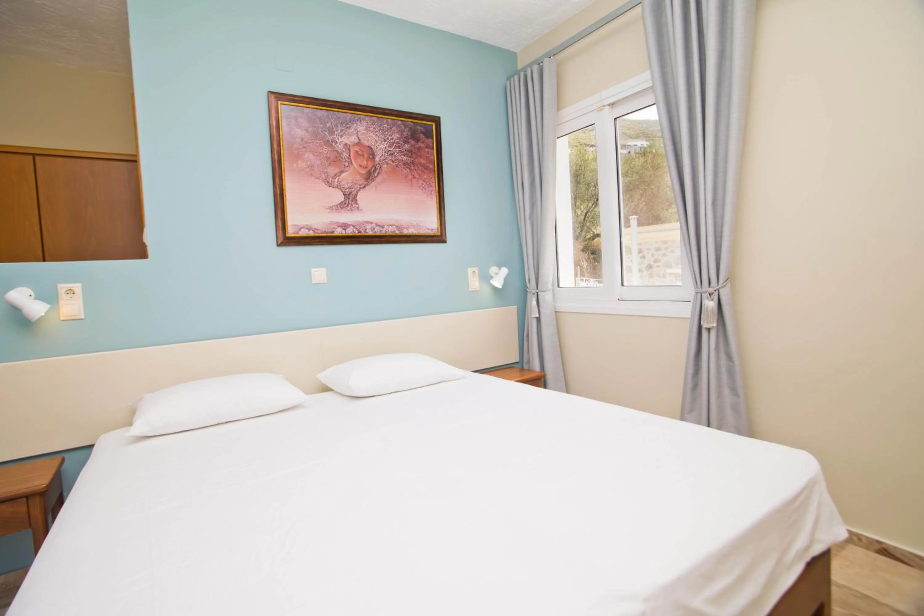 Bed in Acropolis Hotel