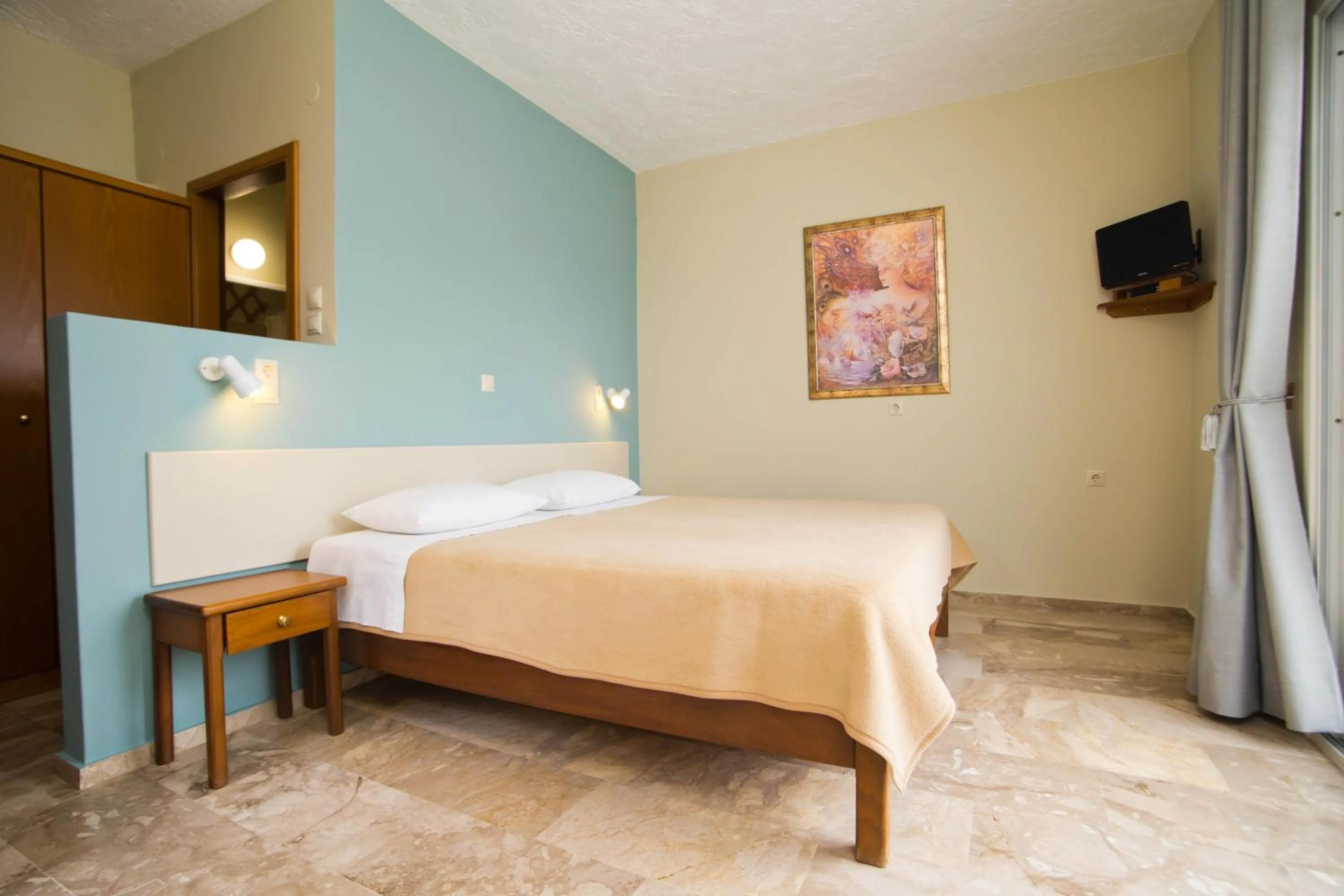 Bed in Acropolis Hotel