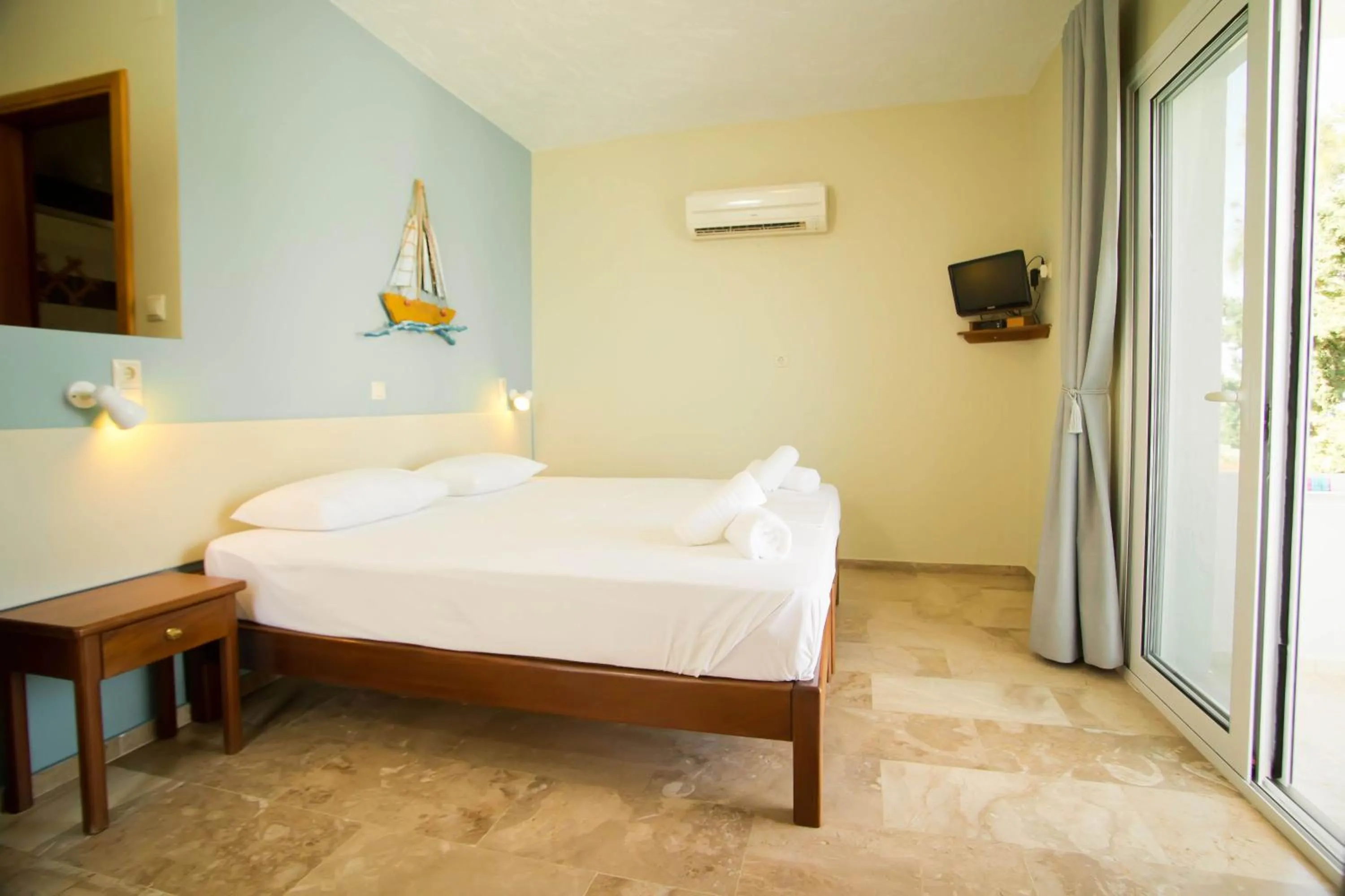 Bed in Acropolis Hotel