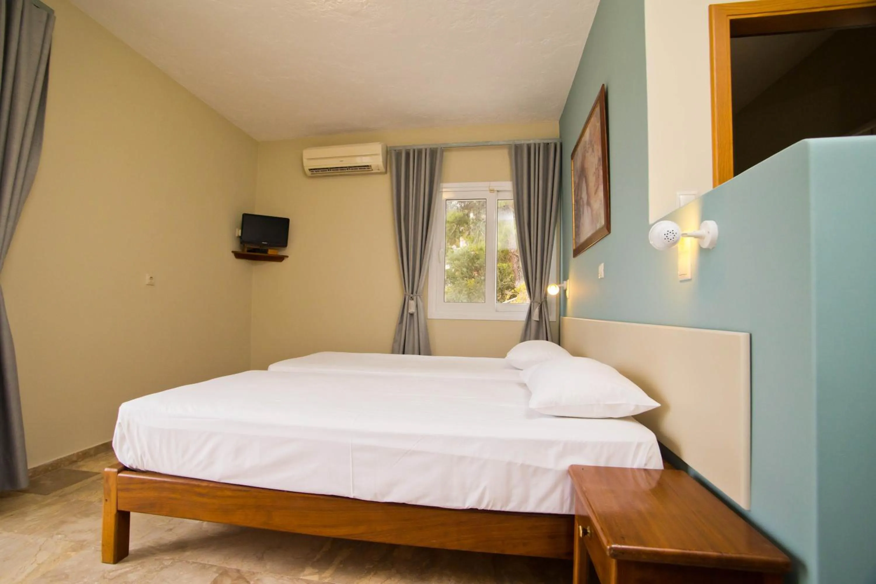 Bed in Acropolis Hotel