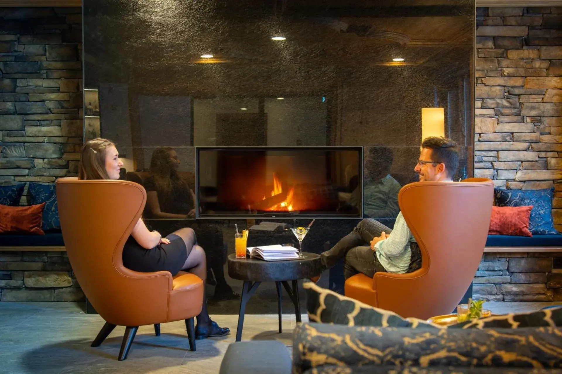 Lounge or bar in Walliserhof Grand-Hotel & Spa Relais & Châteaux Lounge or bar in Walliserhof Grand-Hotel & Spa Relais & Châteaux