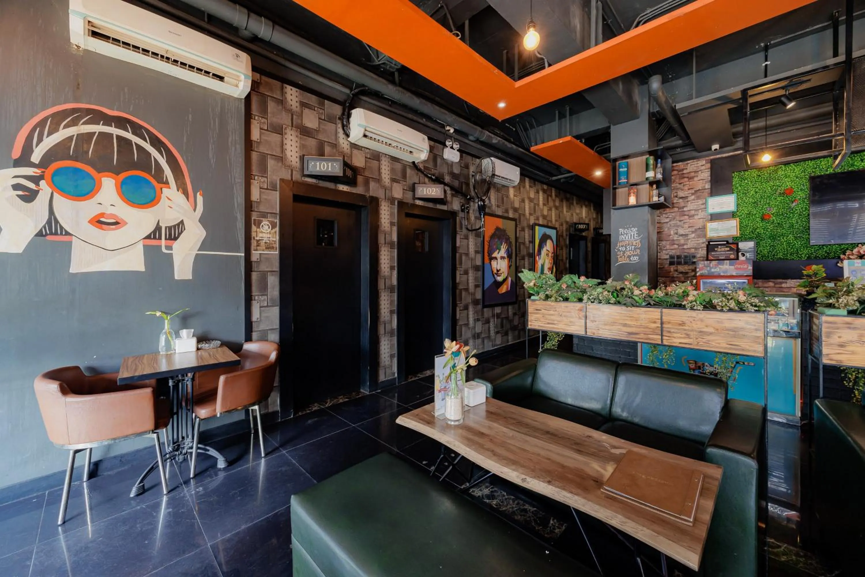 Seating area in Sans Hotel Roxy Jakarta