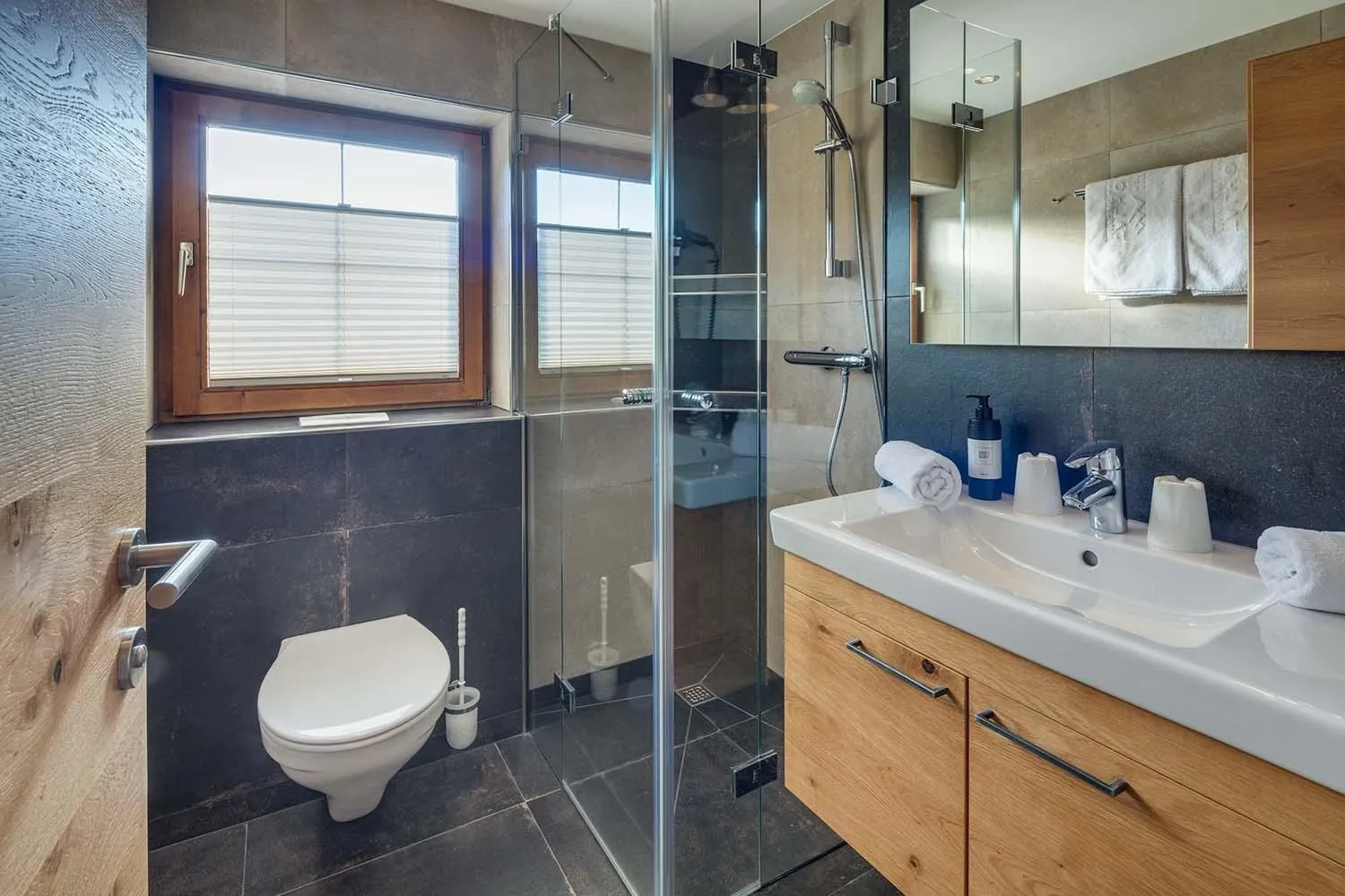 Bathroom in Apparthotel Talhof, Restaurant, Pool und Spa