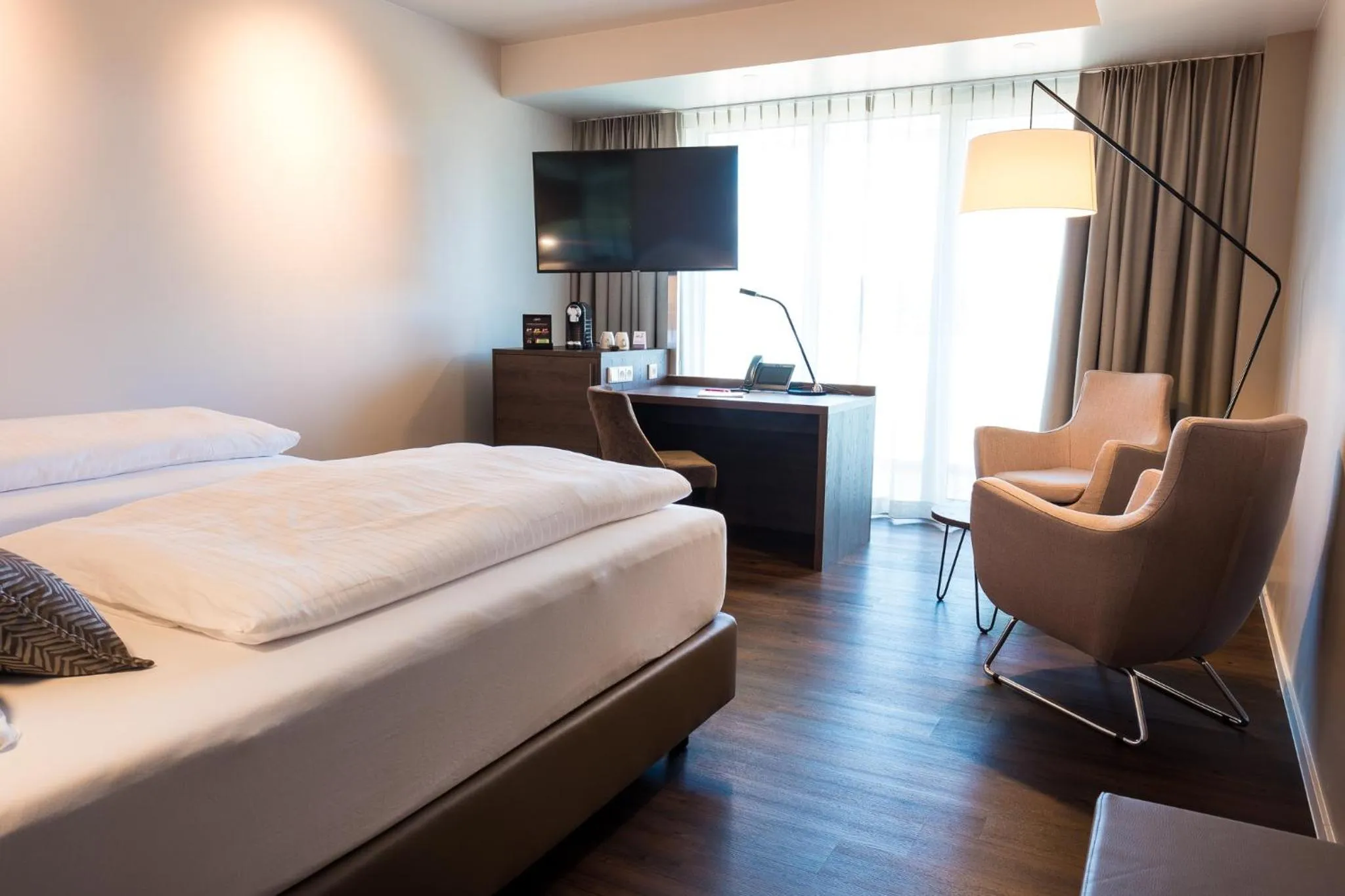 Bed in Rebhan's Business und Wellness Hotel